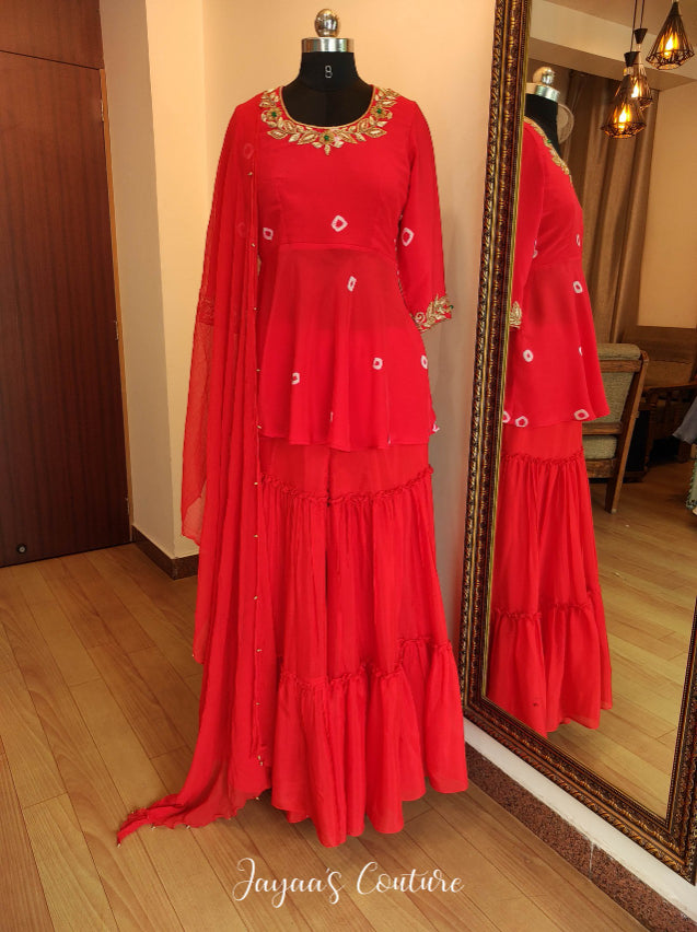 Red peplum with sharara & dupatta