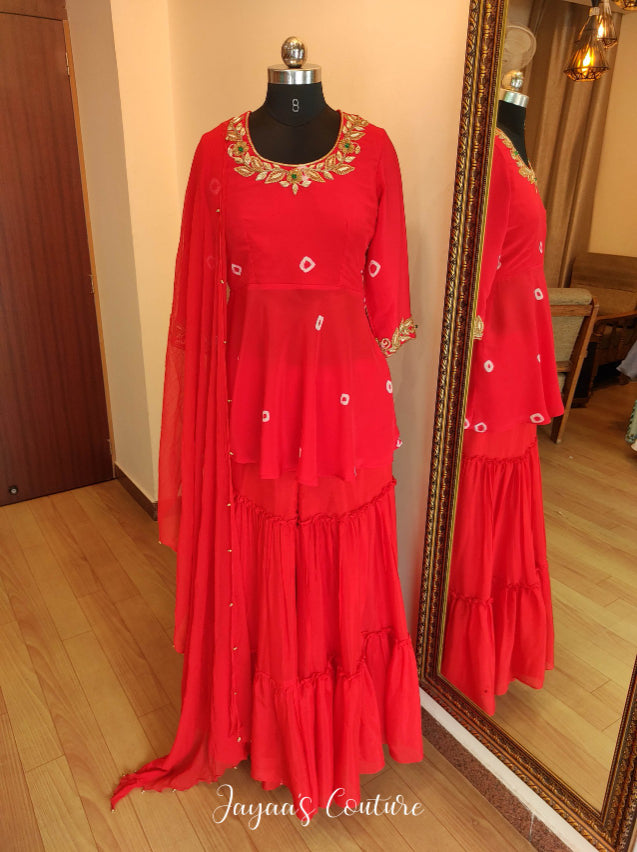 Red peplum with sharara & dupatta
