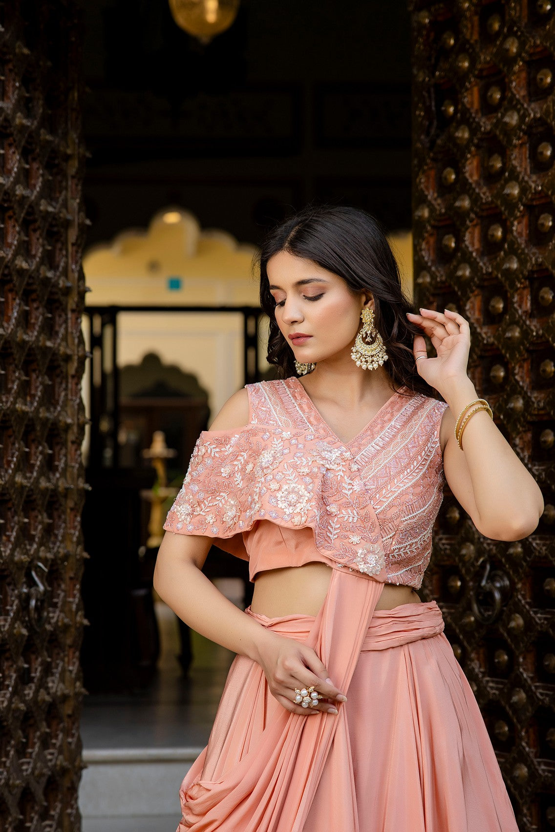 Pastel peach drape lehenga set