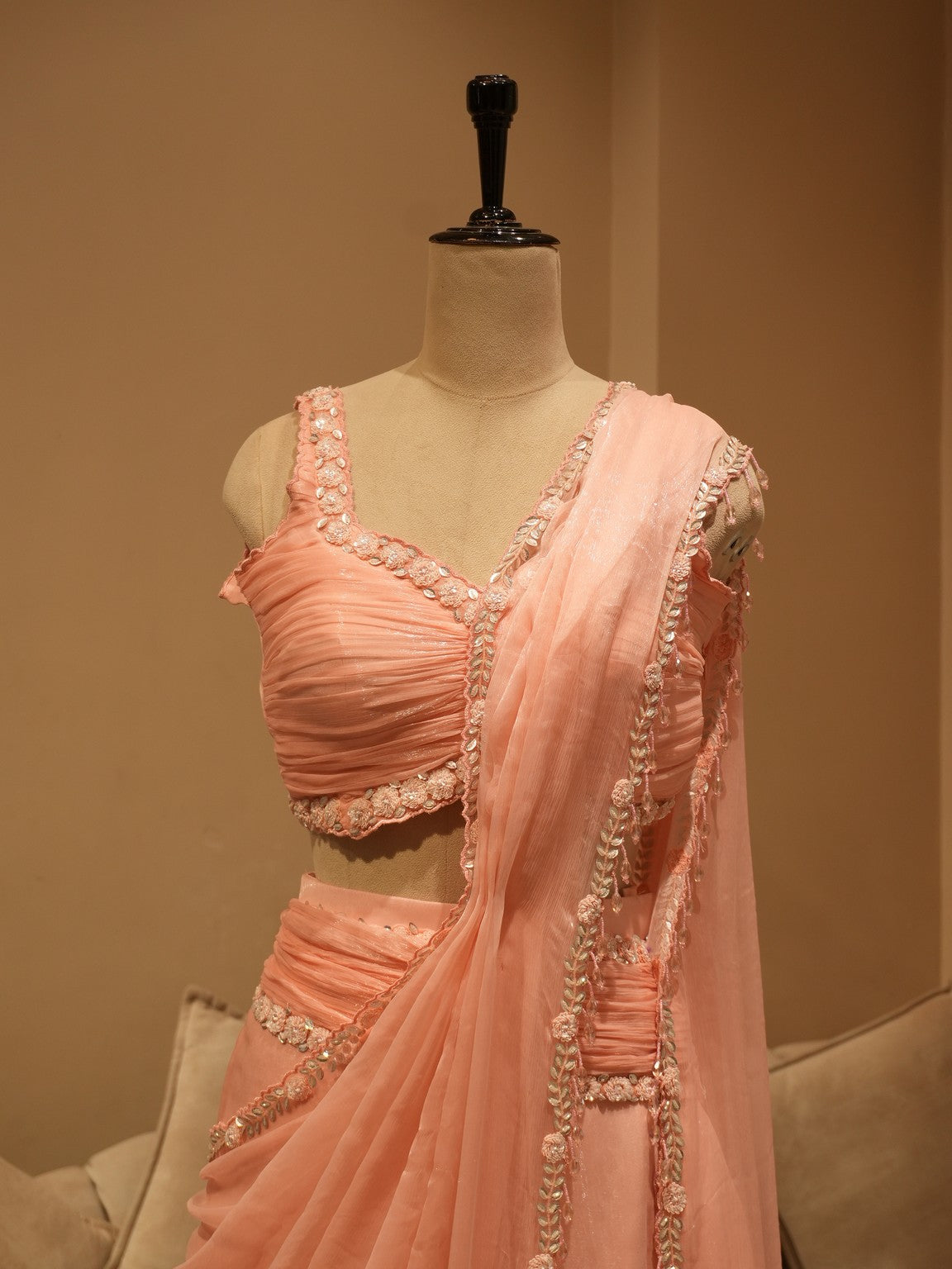 Pastel peachish pink drape saree