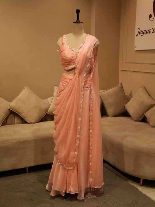 Pastel peachish pink drape saree