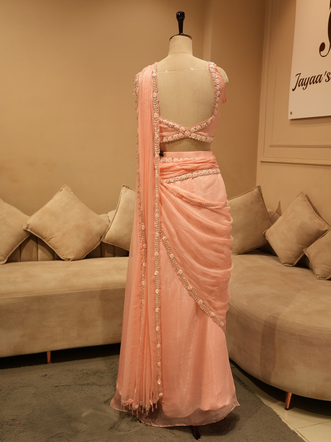 Pastel peachish pink drape saree