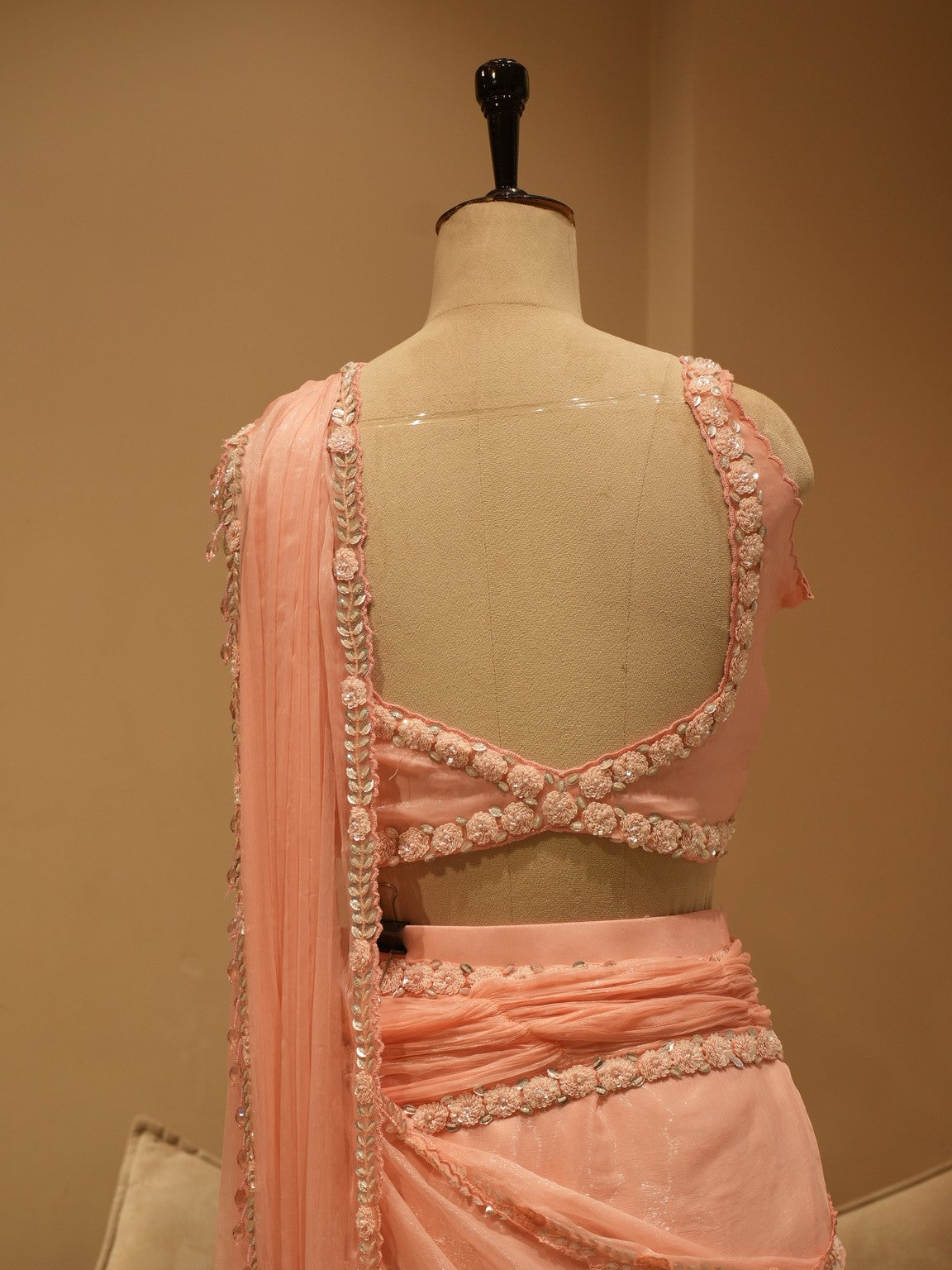 Pastel peachish pink drape saree