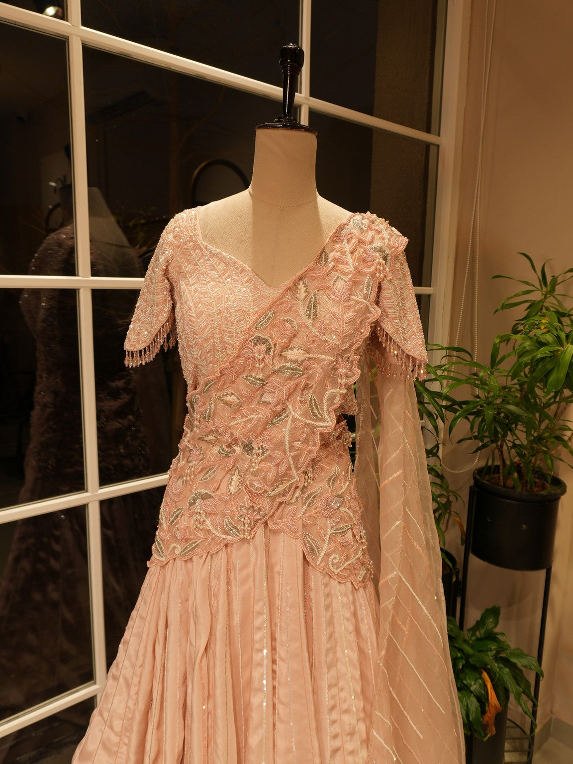 Pastel peach drape lehenga set