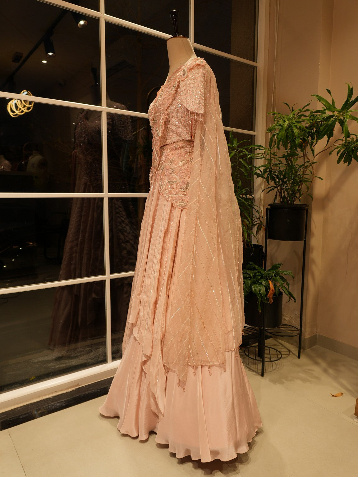 Pastel peach drape lehenga set