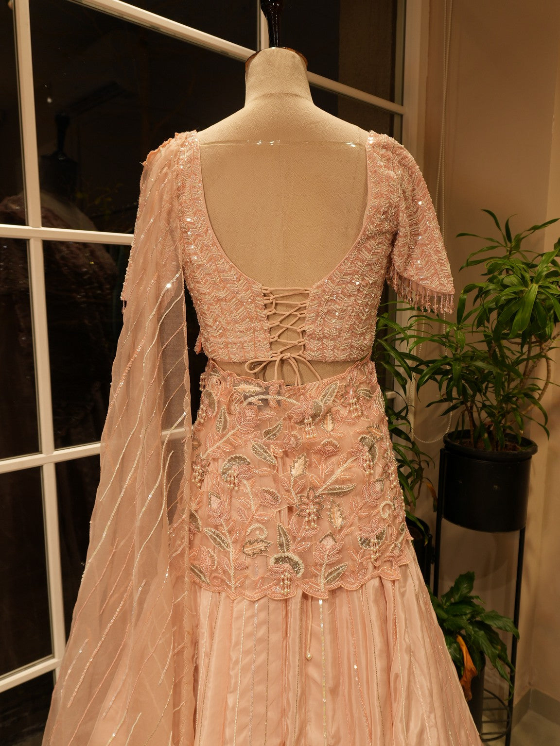 Pastel peach drape lehenga set