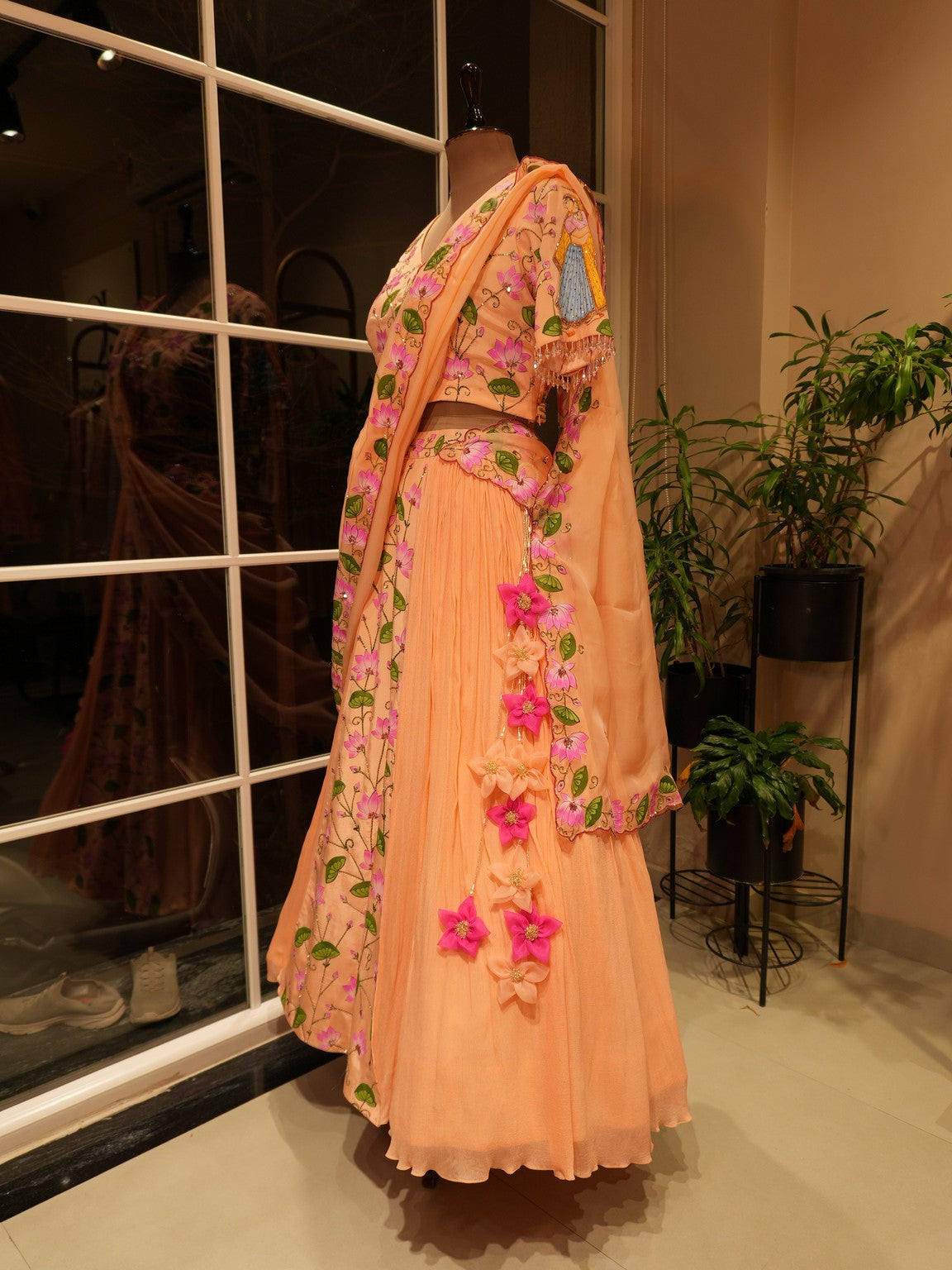 Pastel rust orange hand painted radha krishna ji pichwai lehenga set