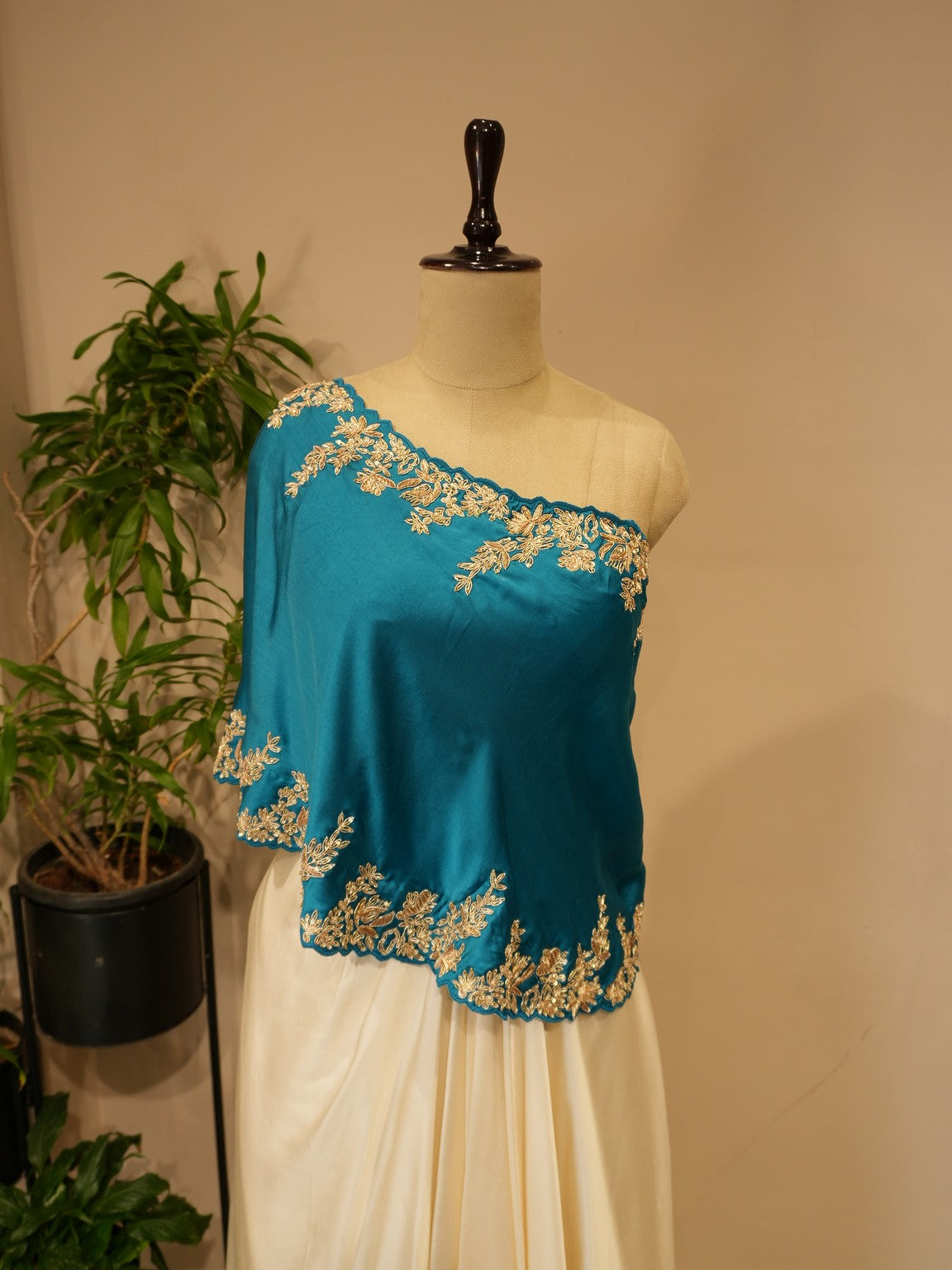 Turquoise blue cape top with drape skirt