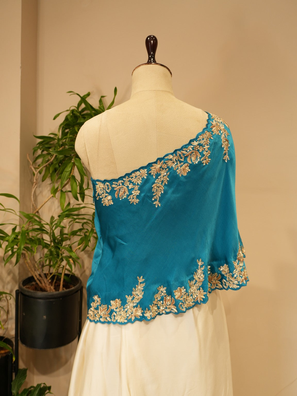 Turquoise blue cape top with drape skirt