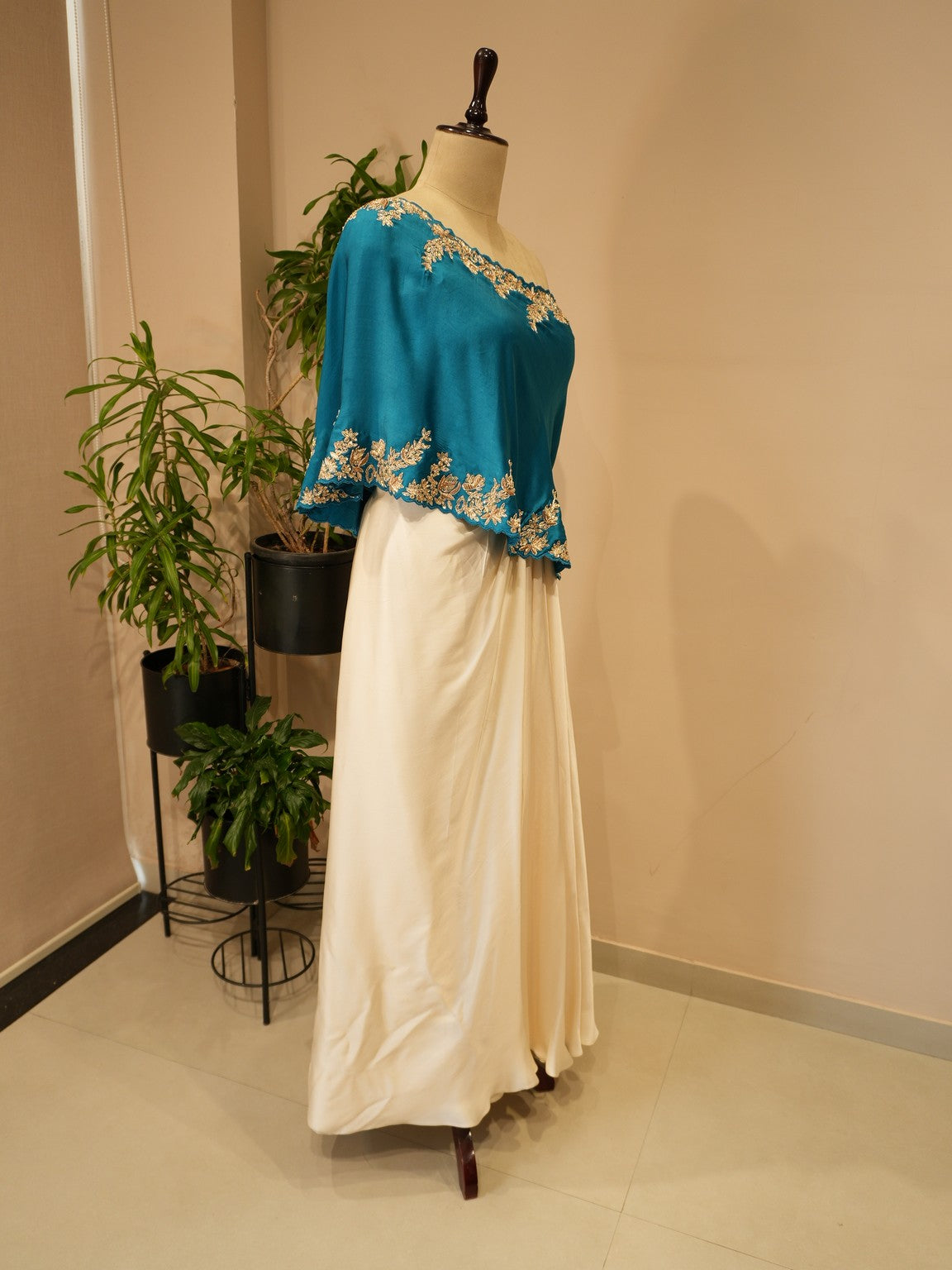 Turquoise blue cape top with drape skirt