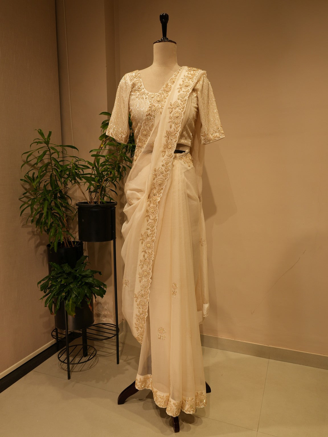 Off white  embroidered saree with cape