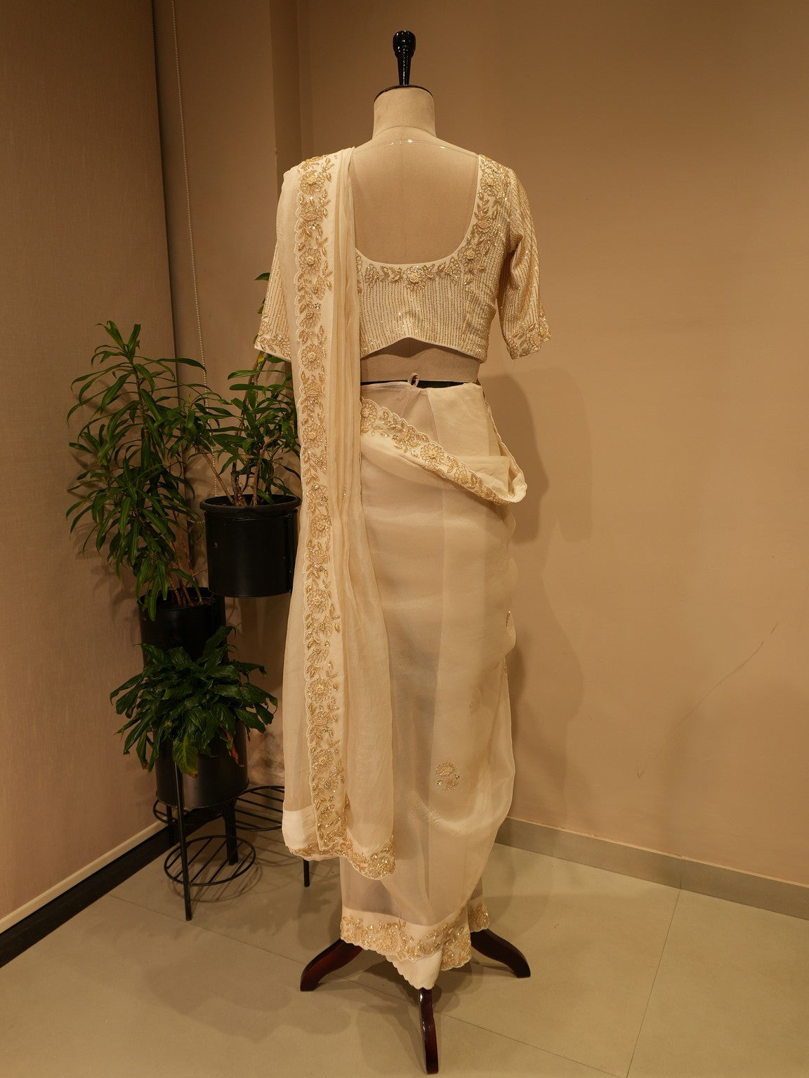 Off white  embroidered saree with cape