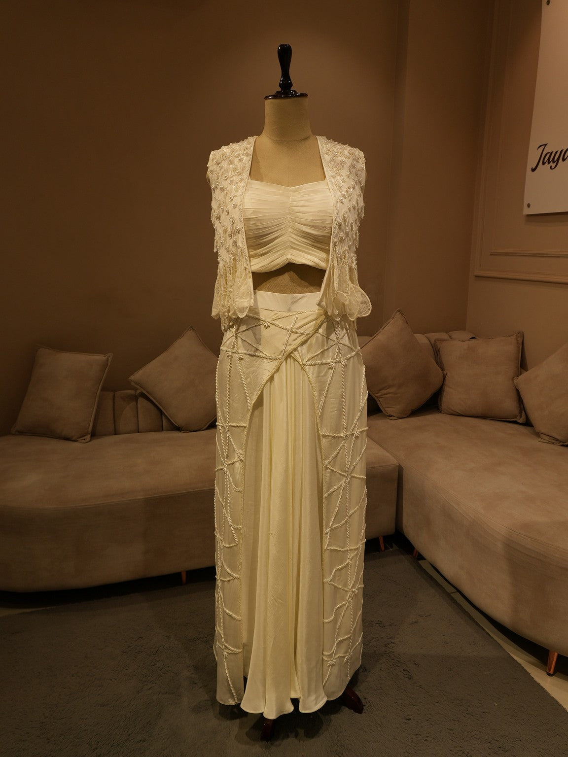 Pearl white cape top with drape skirt