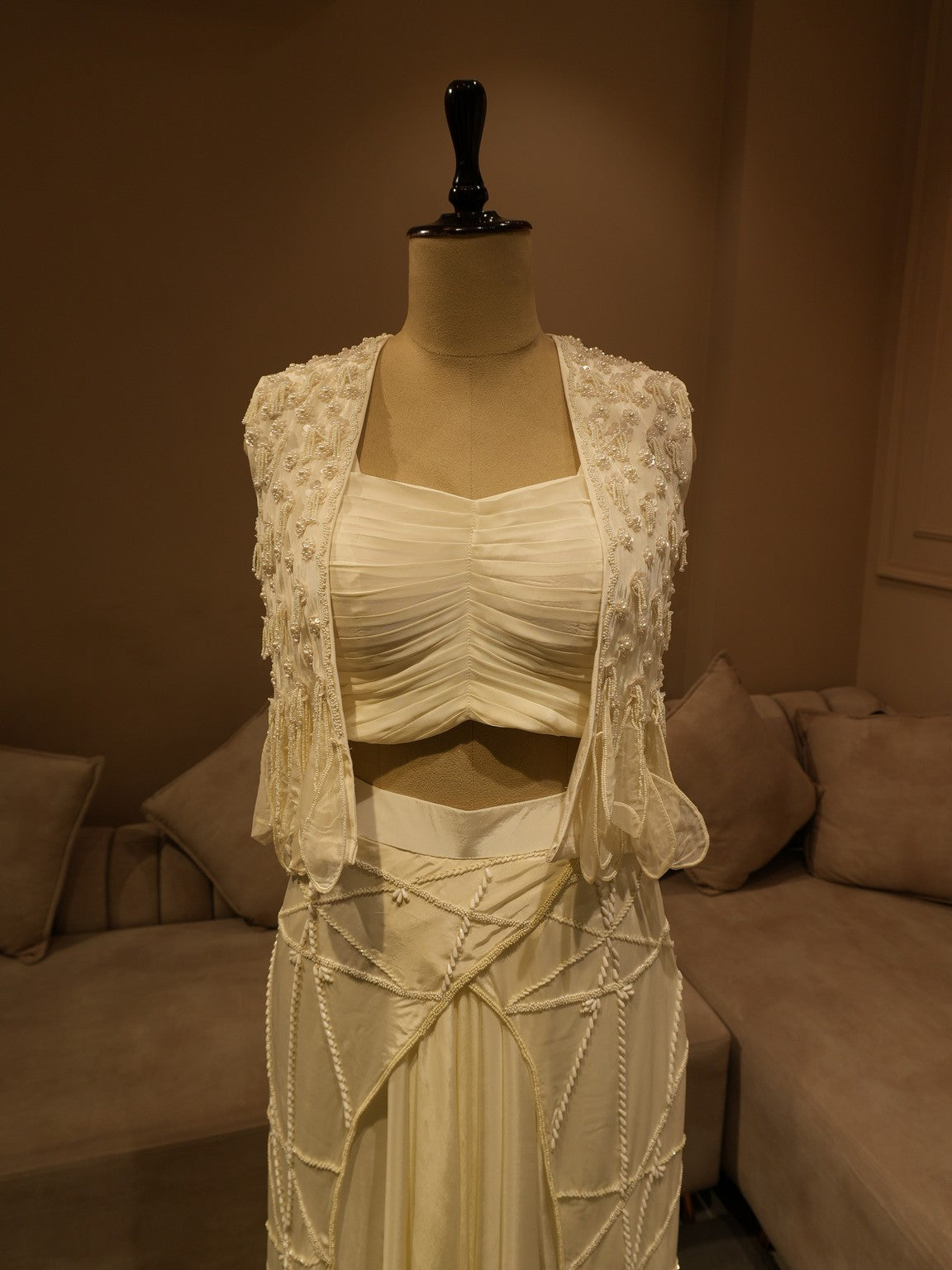 Pearl white cape top with drape skirt