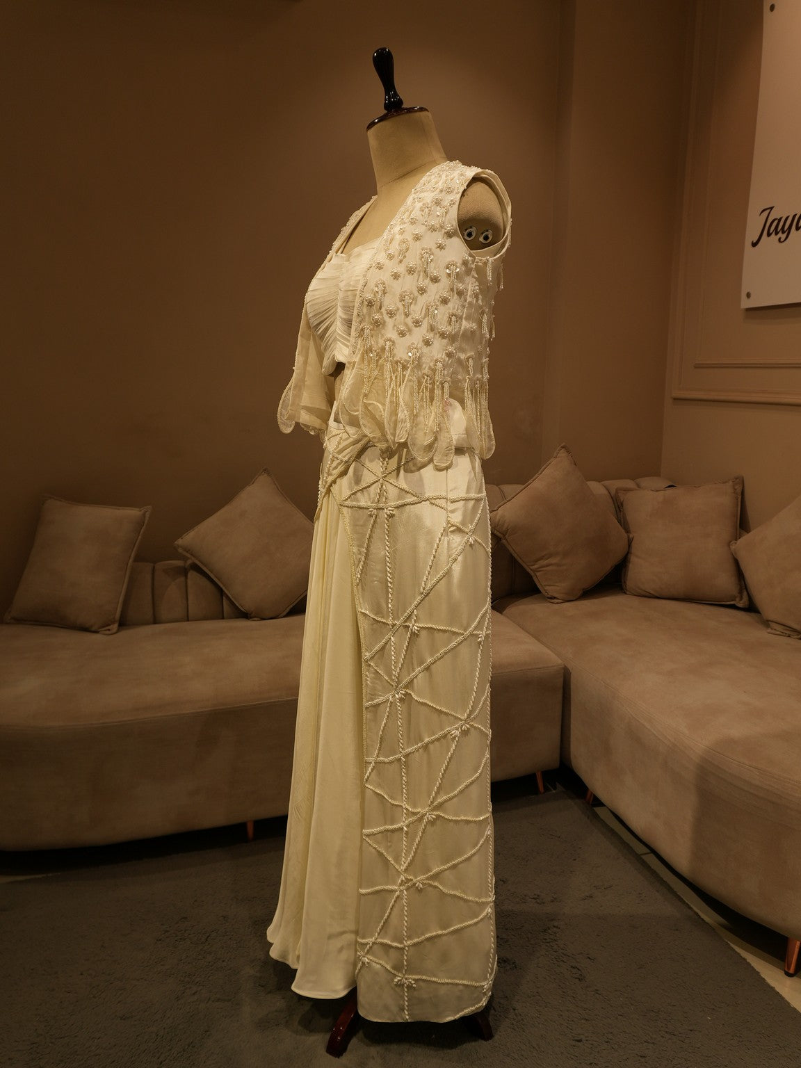 Pearl white cape top with drape skirt