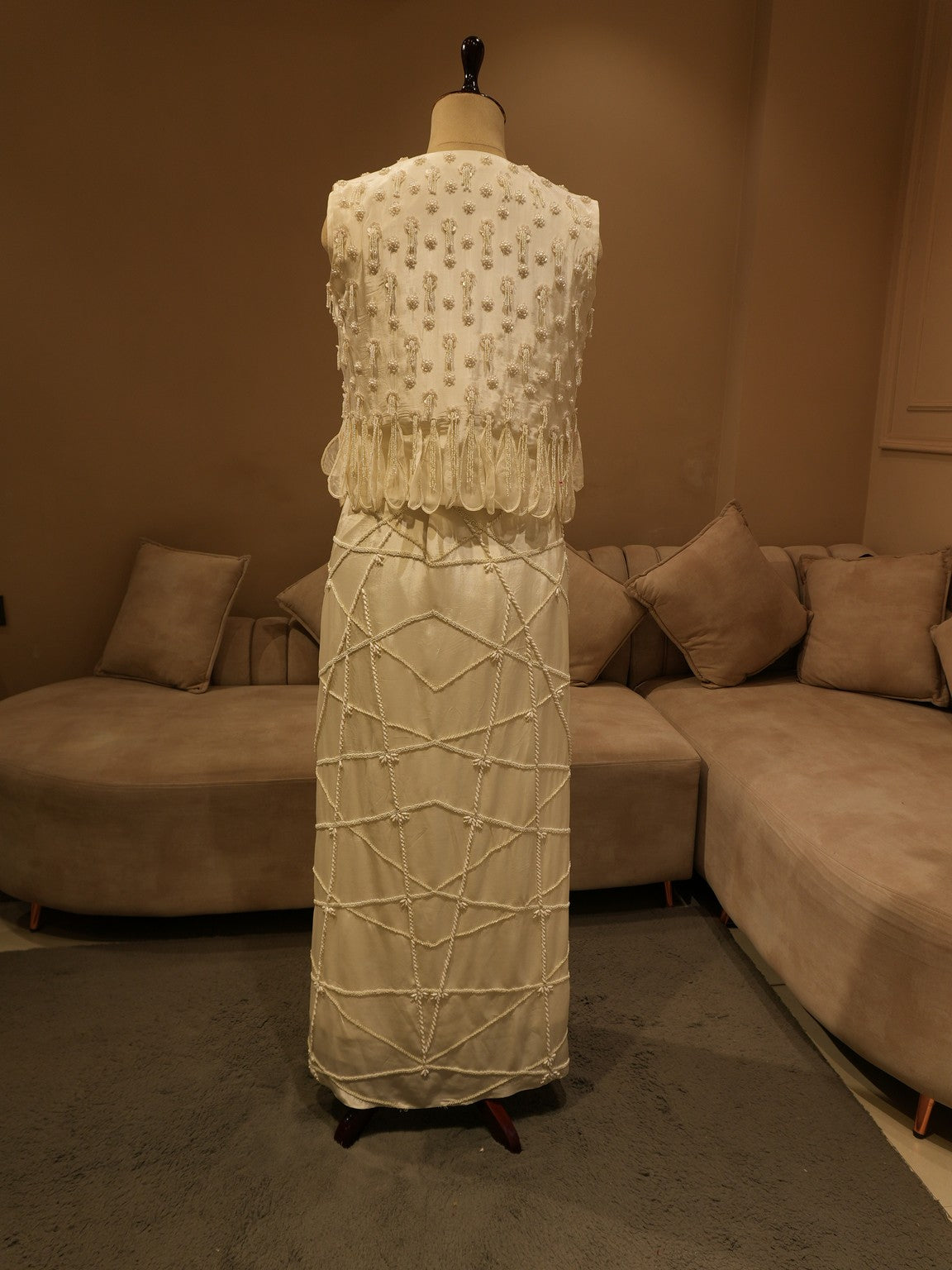 Pearl white cape top with drape skirt