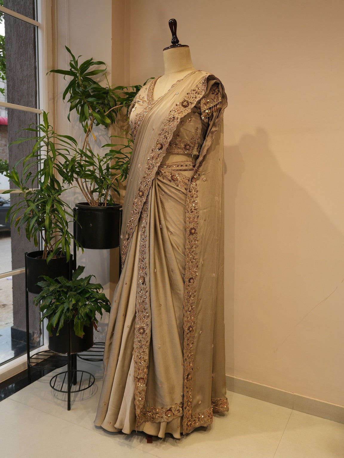 Metallic beige embroidered saree