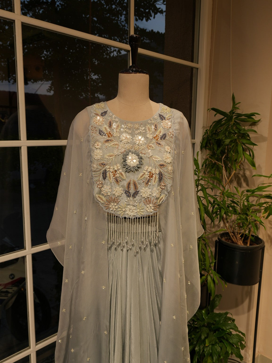 Grey cape top with drape skirt
