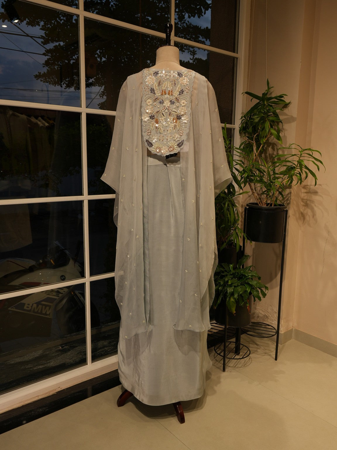 Grey cape top with drape skirt
