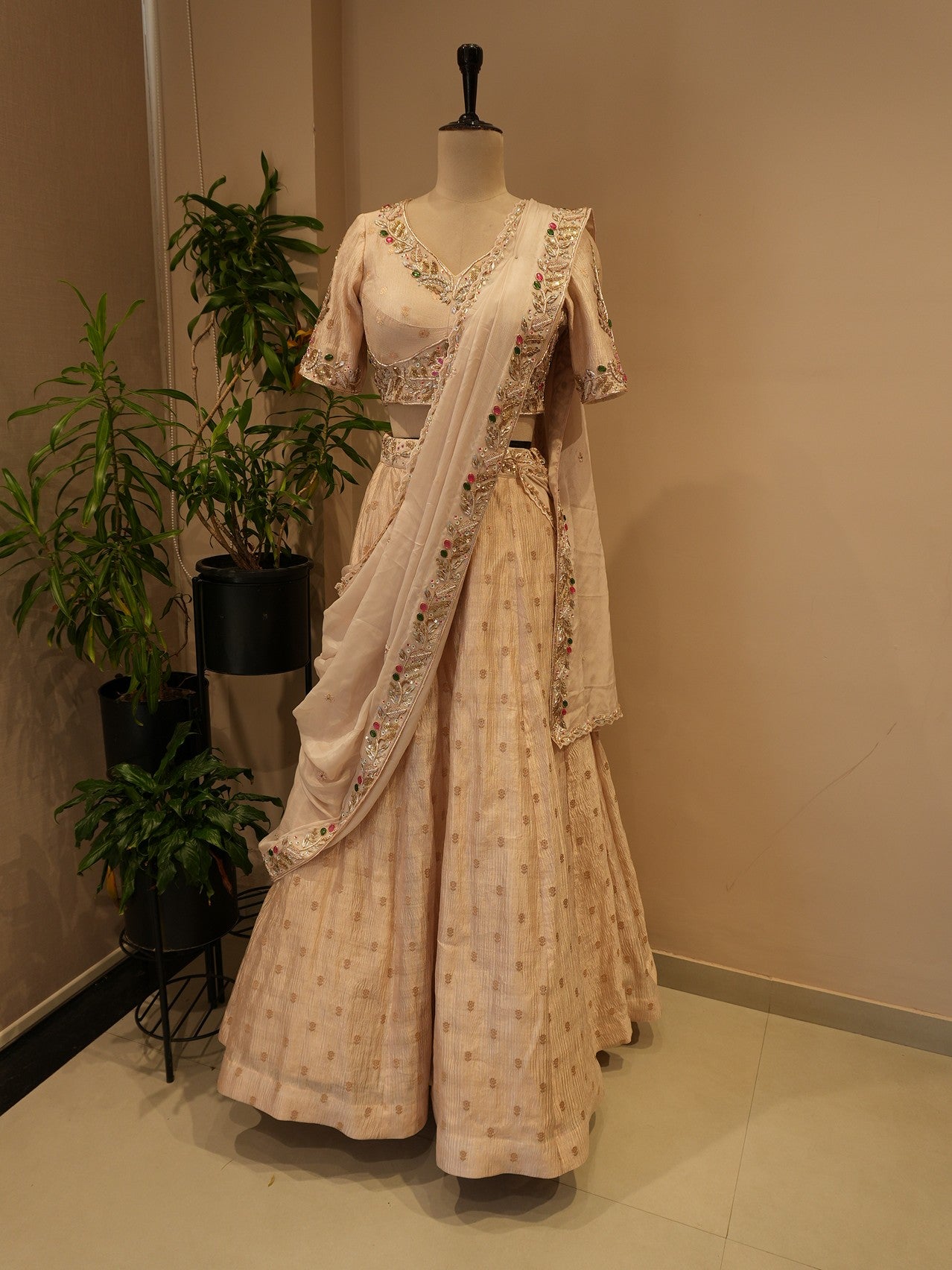 Beige tissue stone zardosi lehenga set