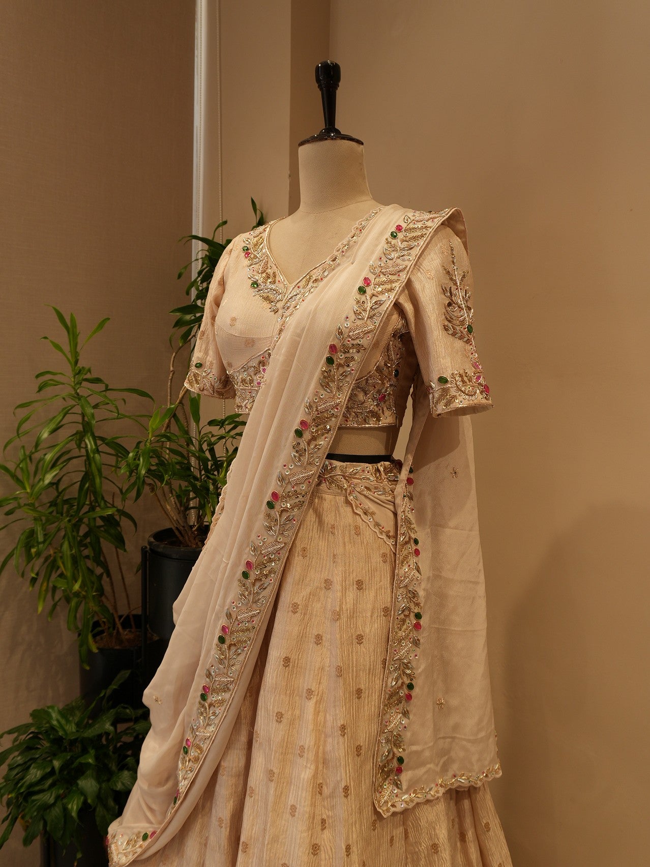 Beige tissue stone zardosi lehenga set