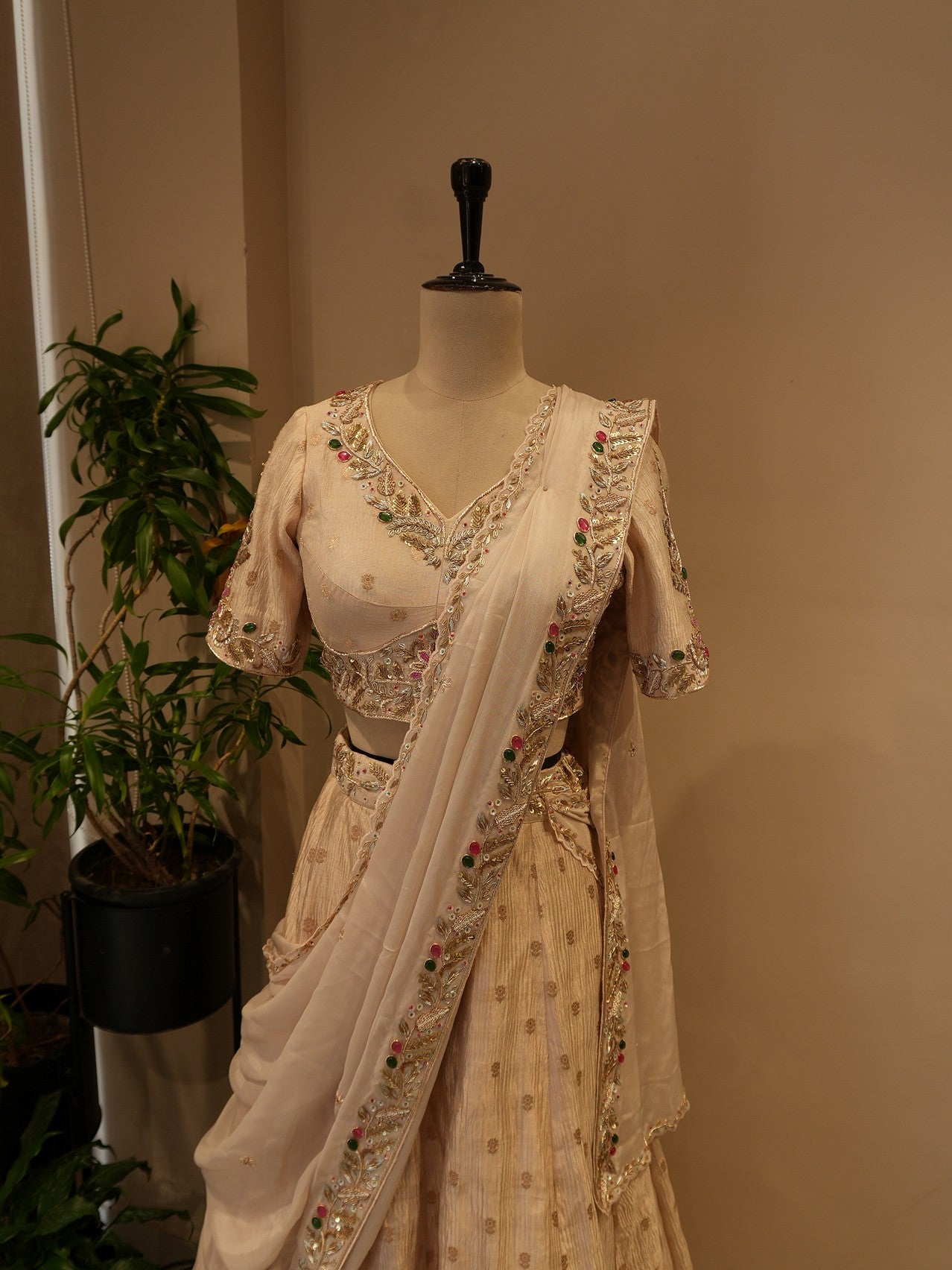Beige tissue stone zardosi lehenga set
