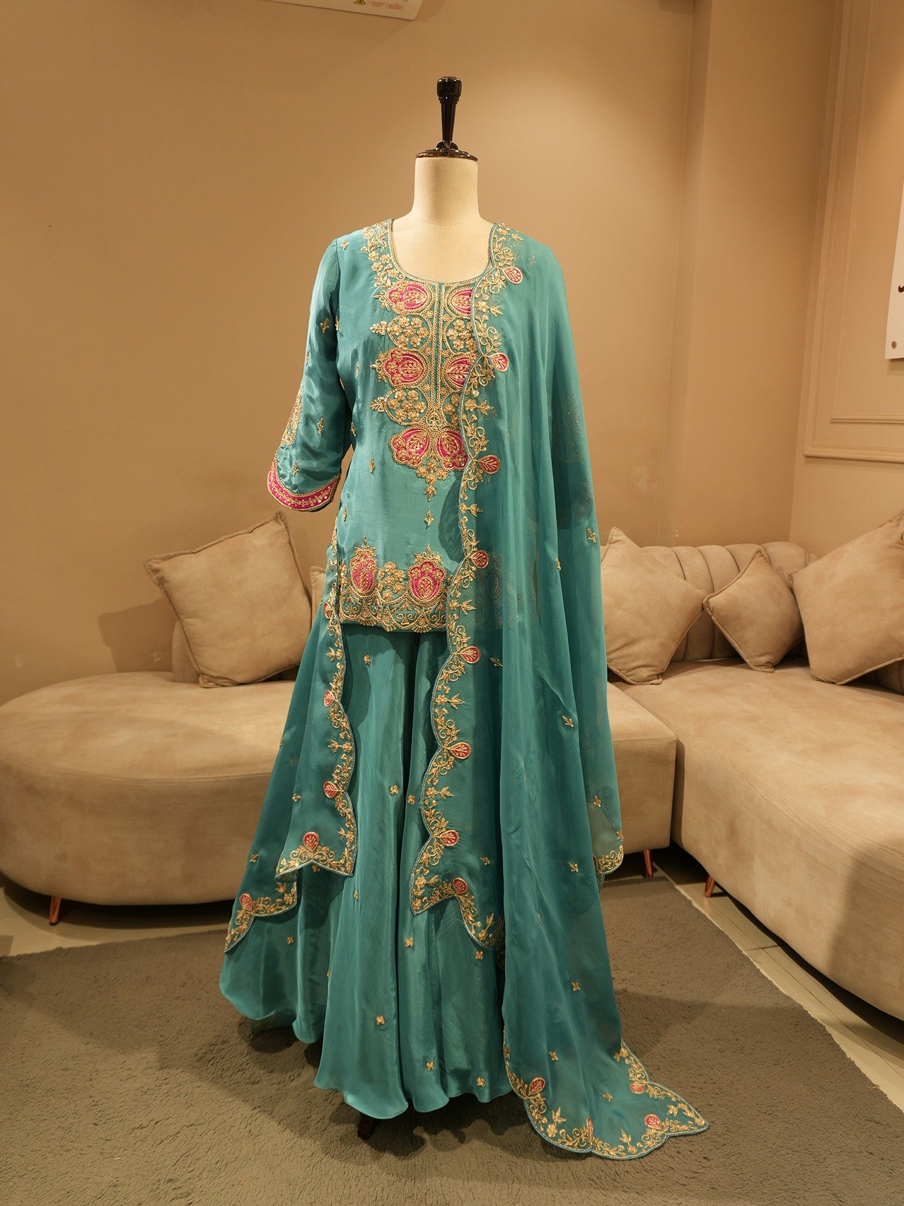Turquoish green embroidered lehenga set