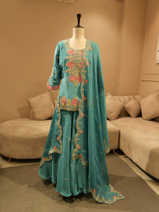 Turquoish green embroidered lehenga set