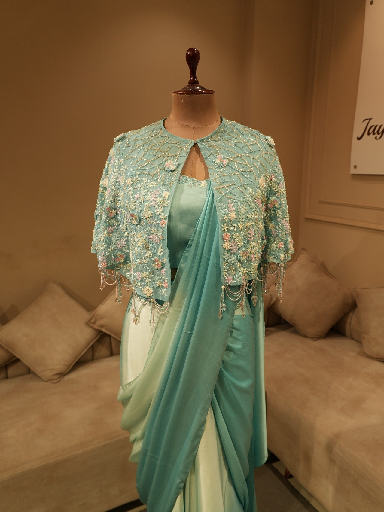 Sea green shaded saree with cape