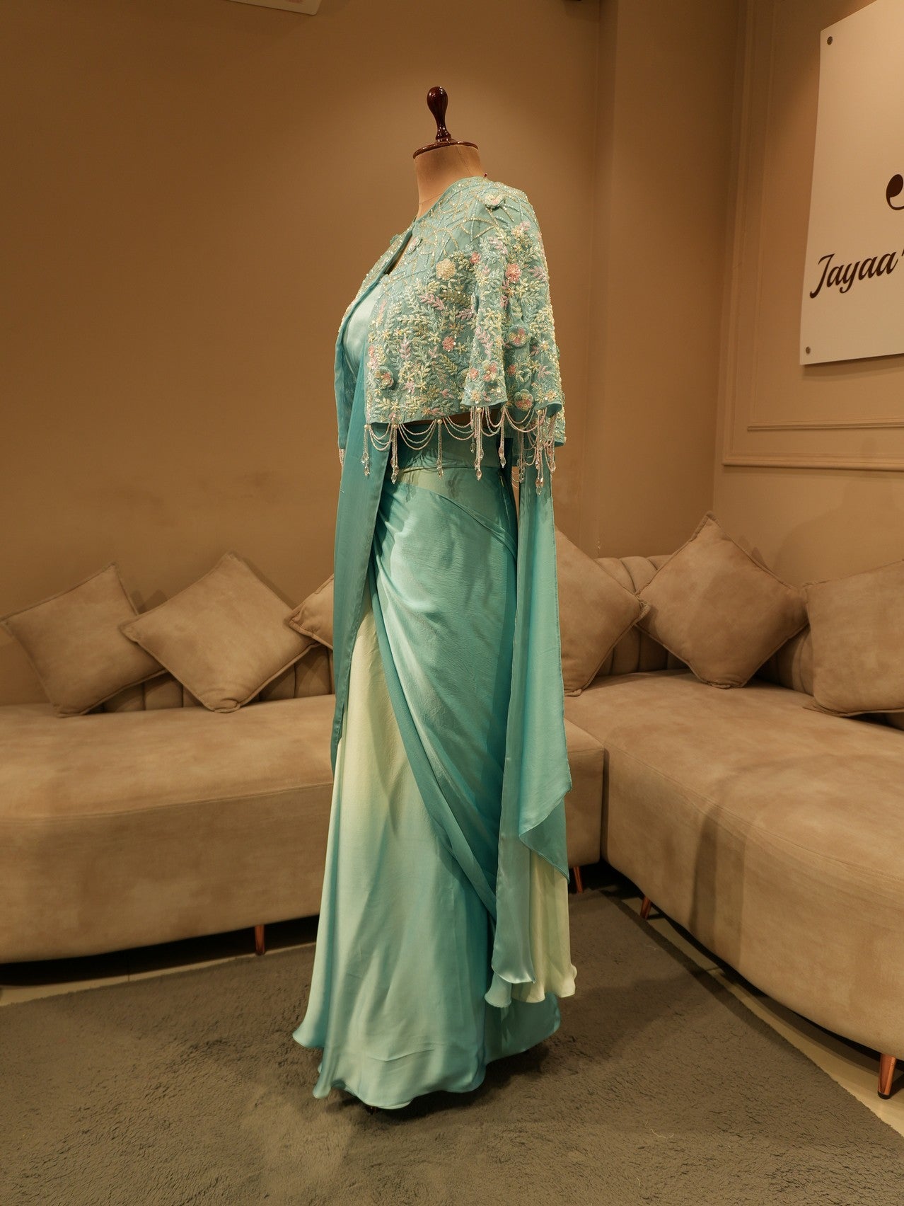 Sea green shaded saree with cape