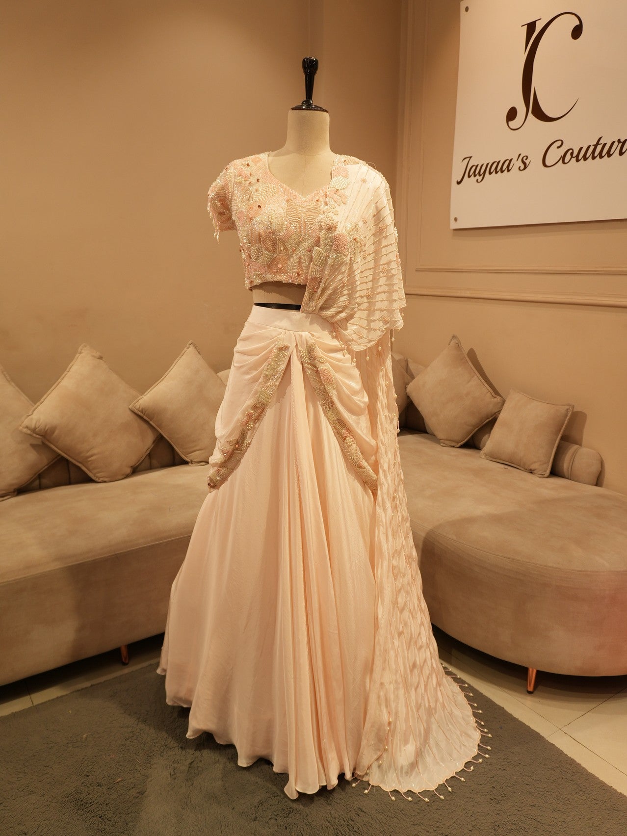 Pastel peach drape lehenga set