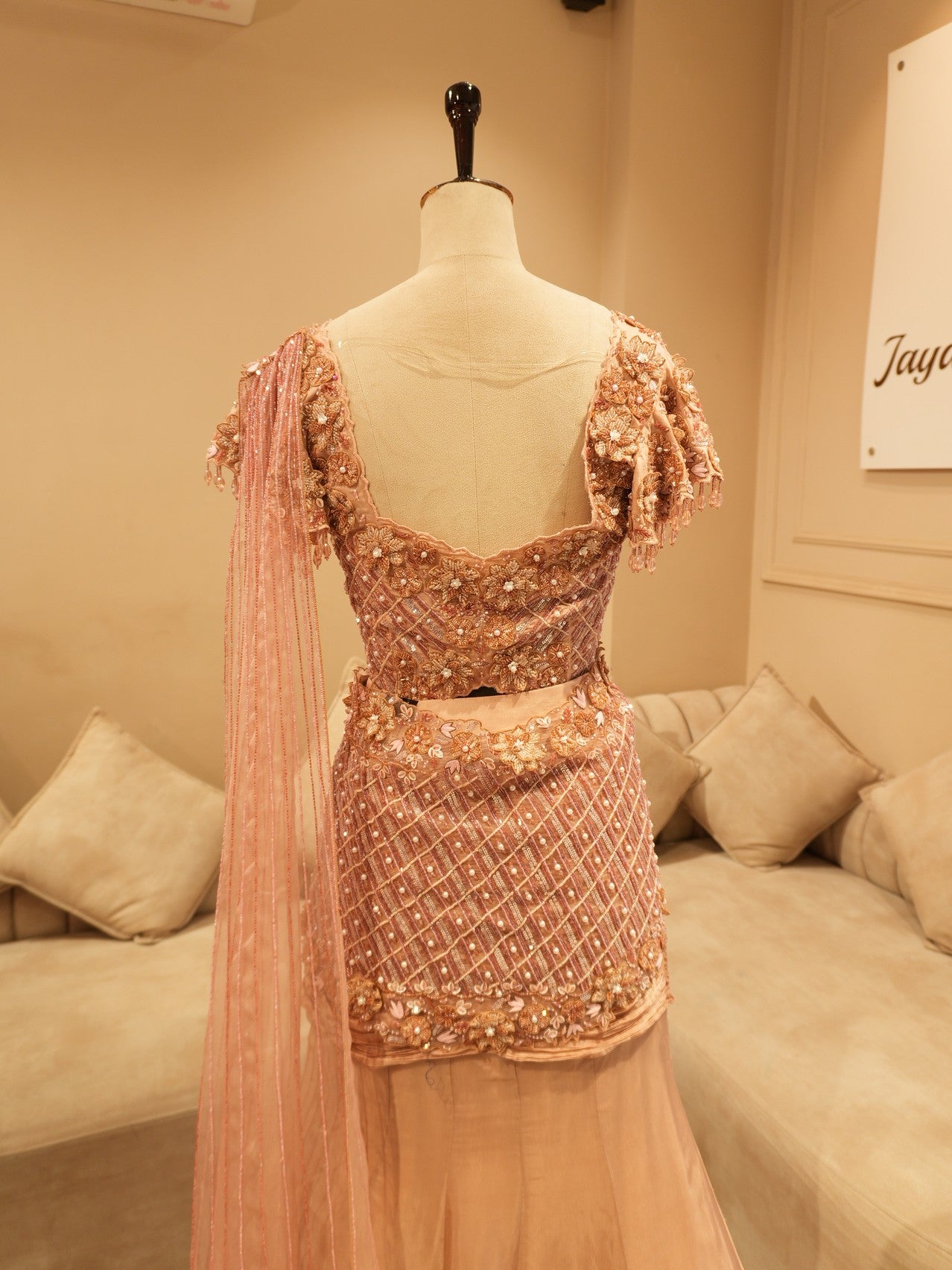 Champagin gold drape lehenga set