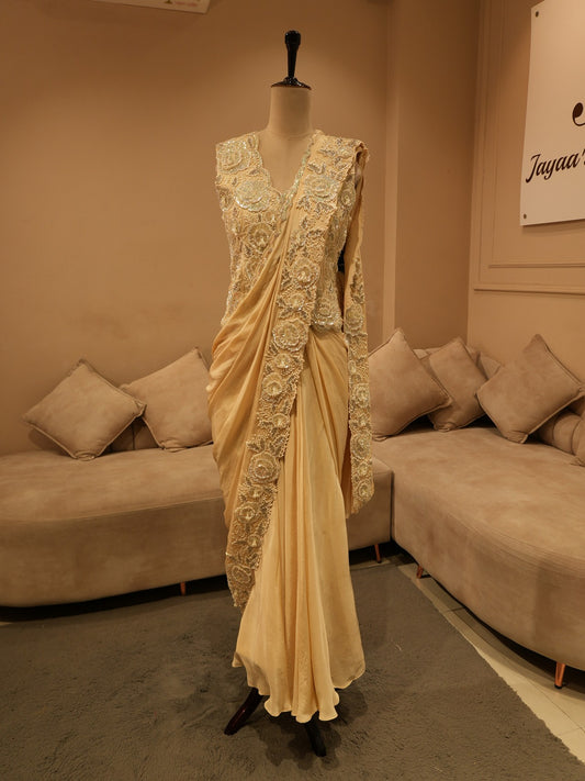 Beige embroidered drape saree