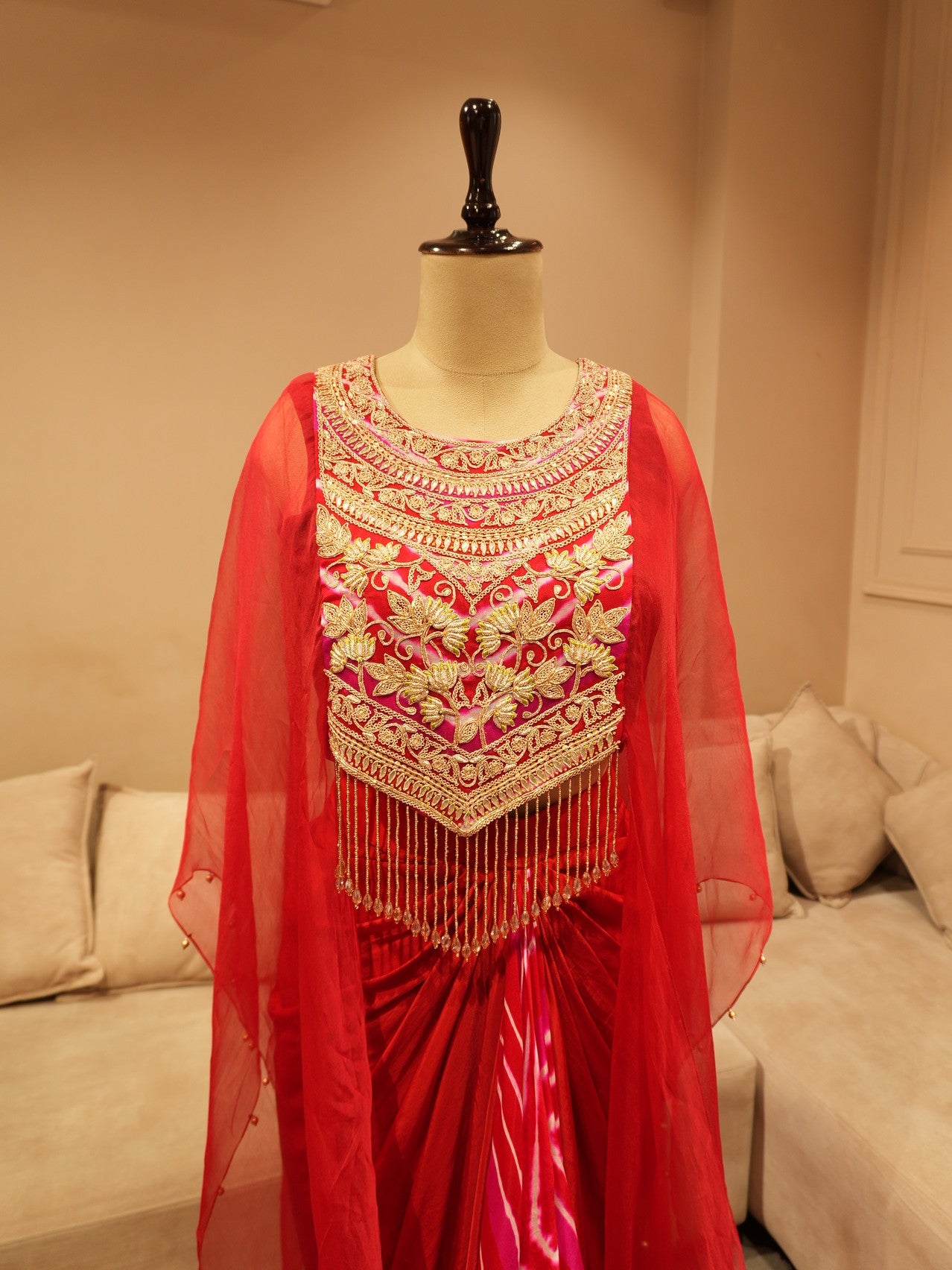 Red zardosi cape top with drape skirt