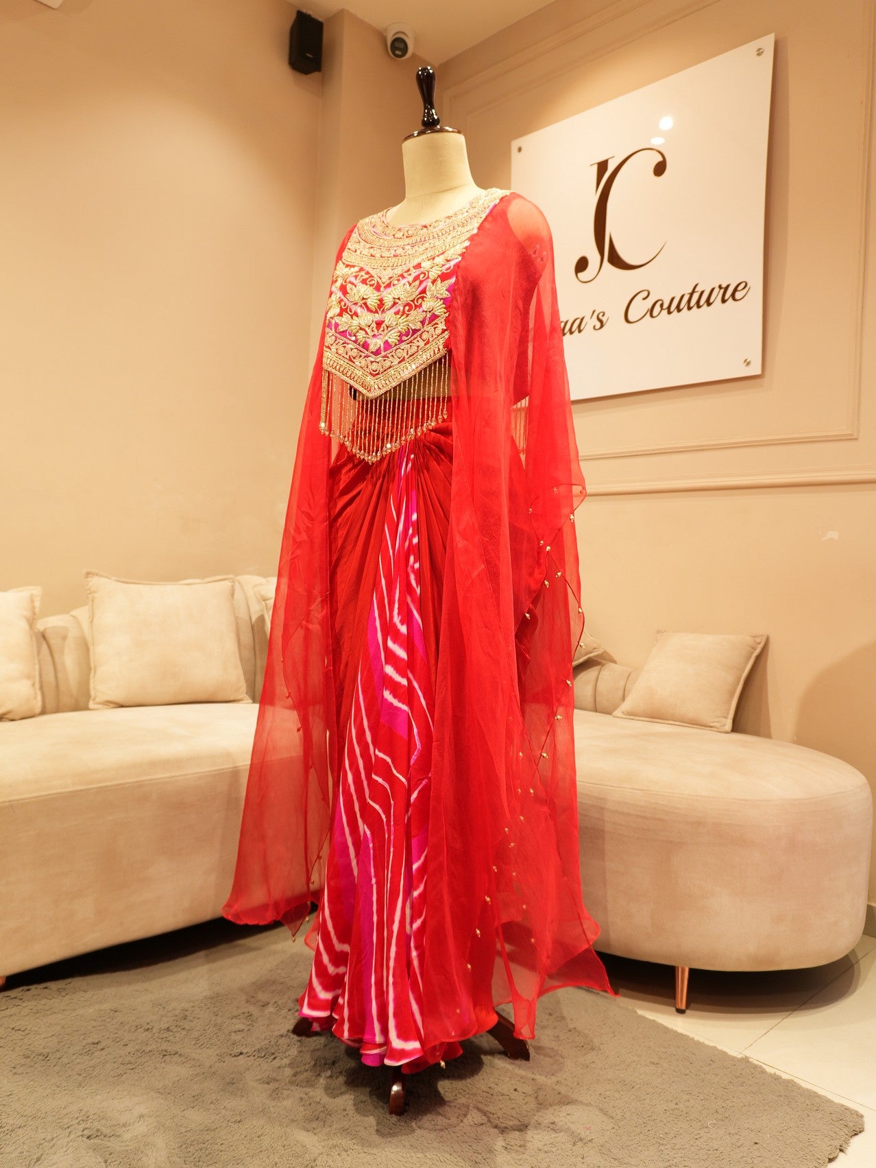 Red zardosi cape top with drape skirt