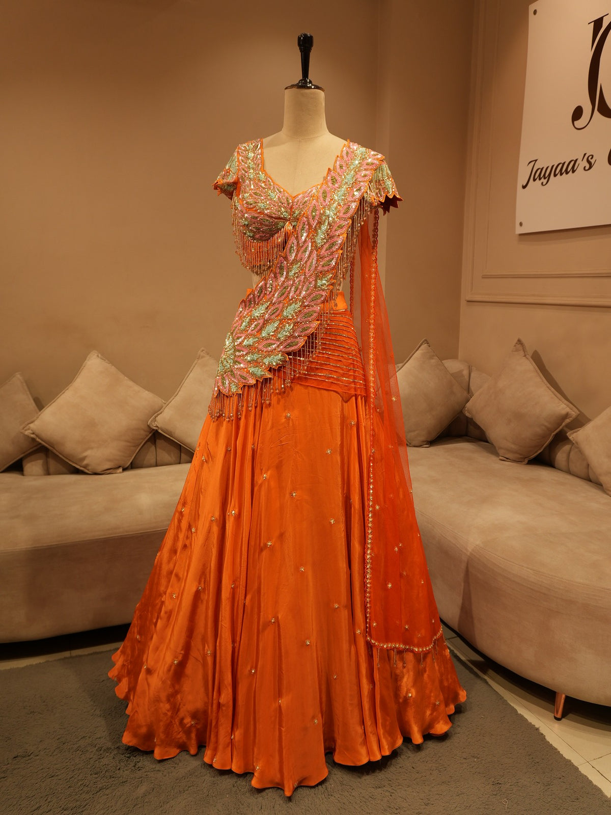 Rust orange embroidered drape lehenga set