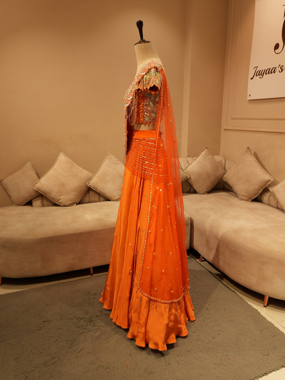 Rust orange embroidered drape lehenga set