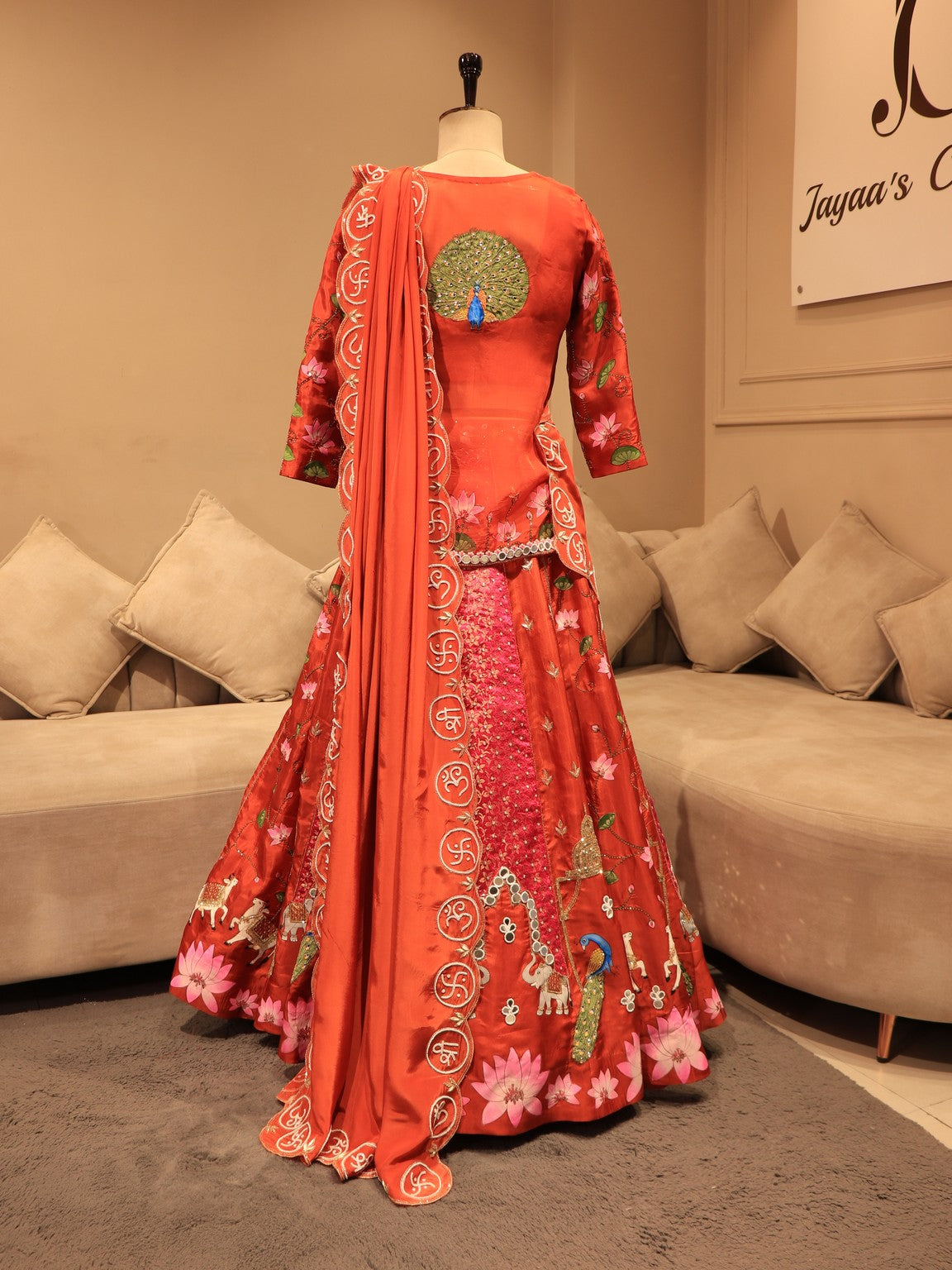 Rust orange hand painted peacock lehenga
