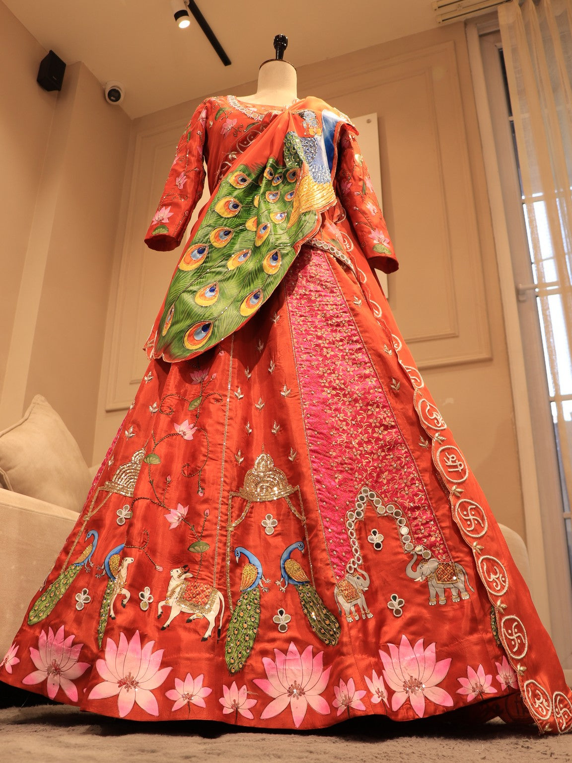 Rust orange hand painted peacock lehenga