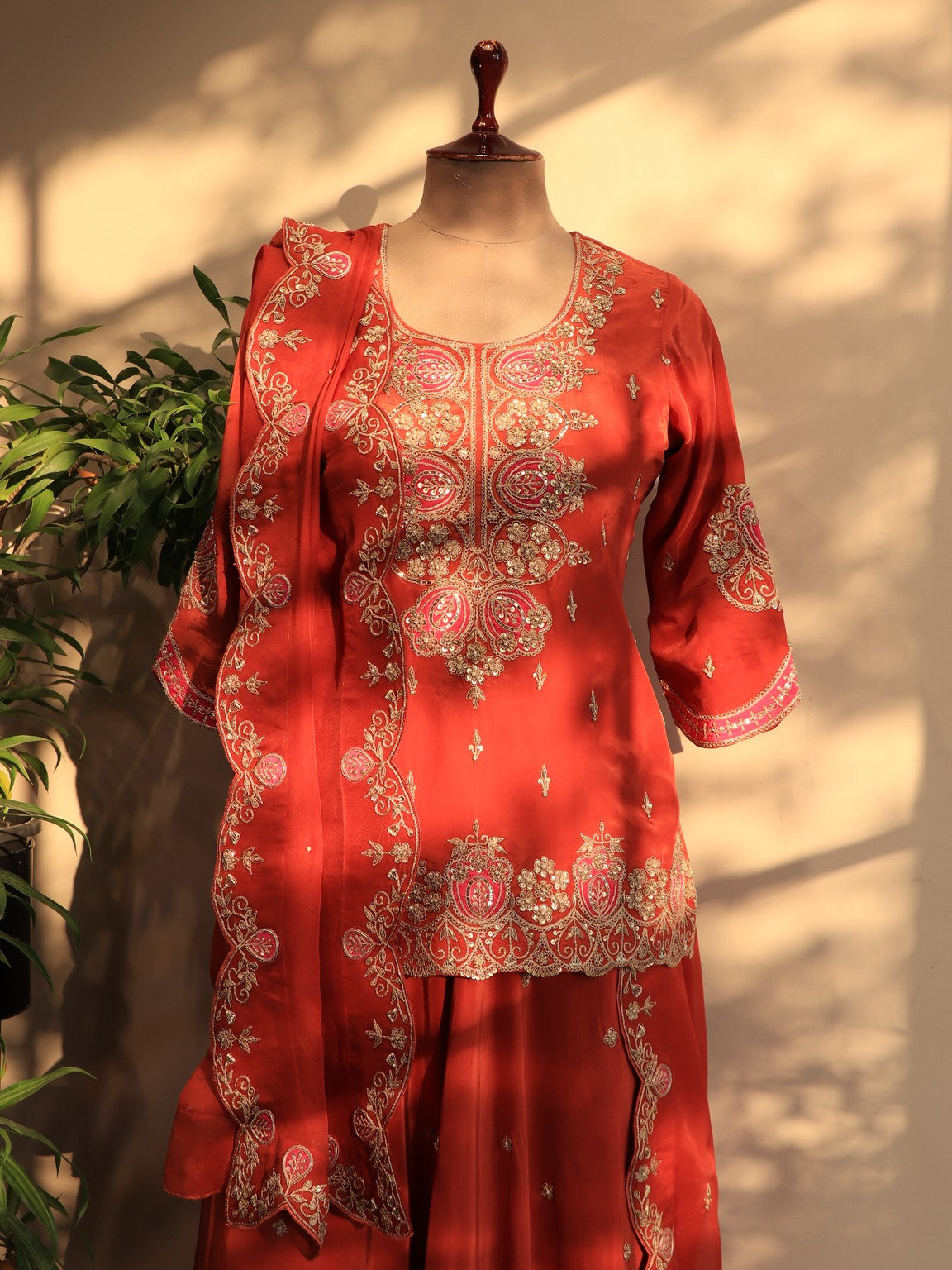 Rust orange kurta with skirt and dupatta