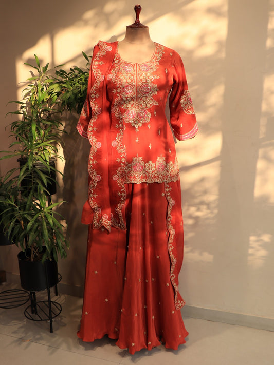 Rust orange kurta with skirt and dupatta
