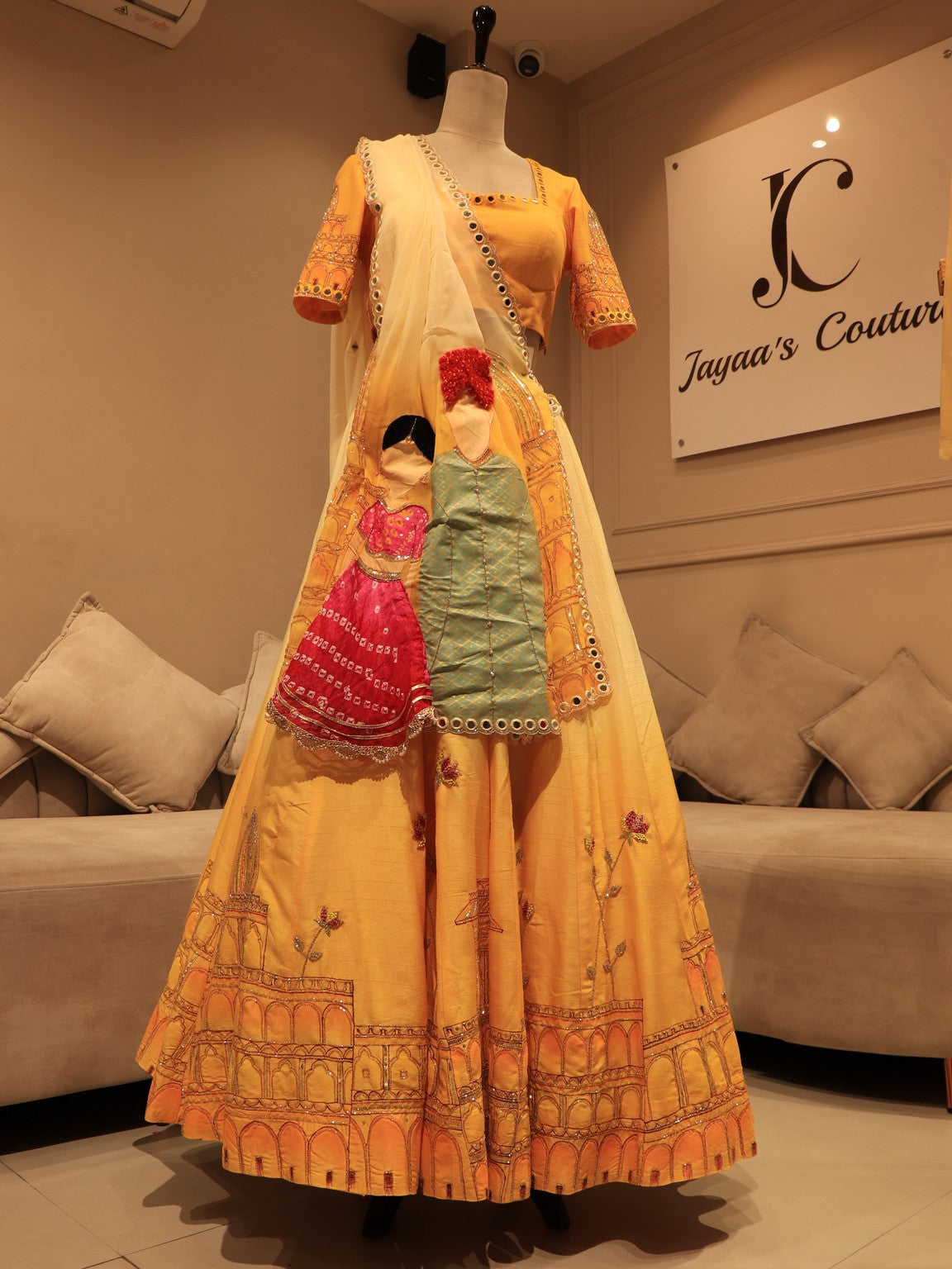 Yellow shaded hand painted lehenga set