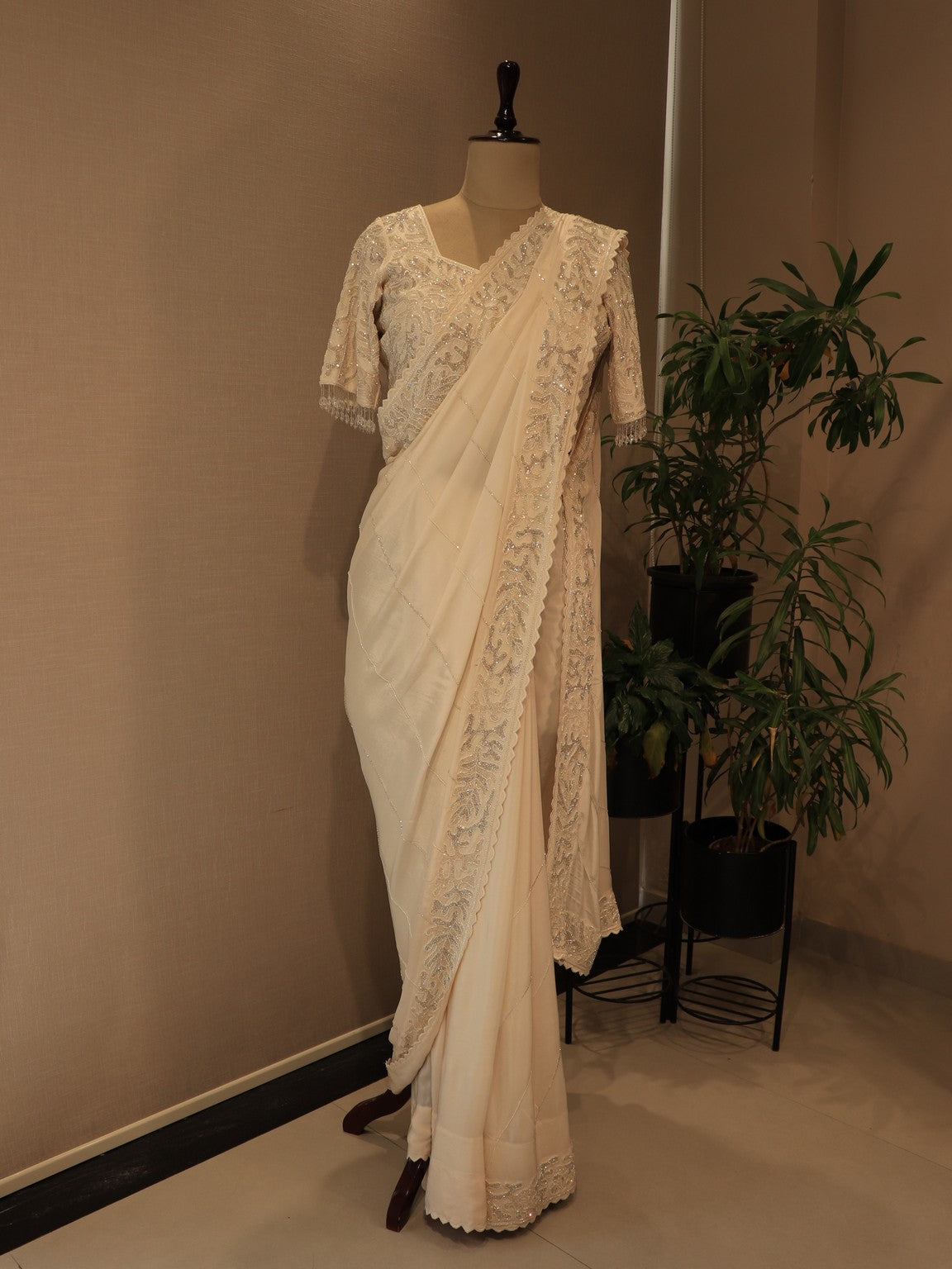 Pearl white embroidered saree