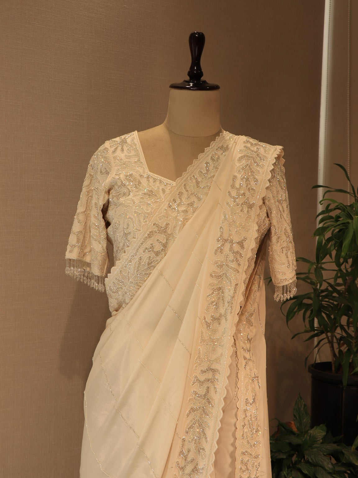 Pearl white embroidered saree