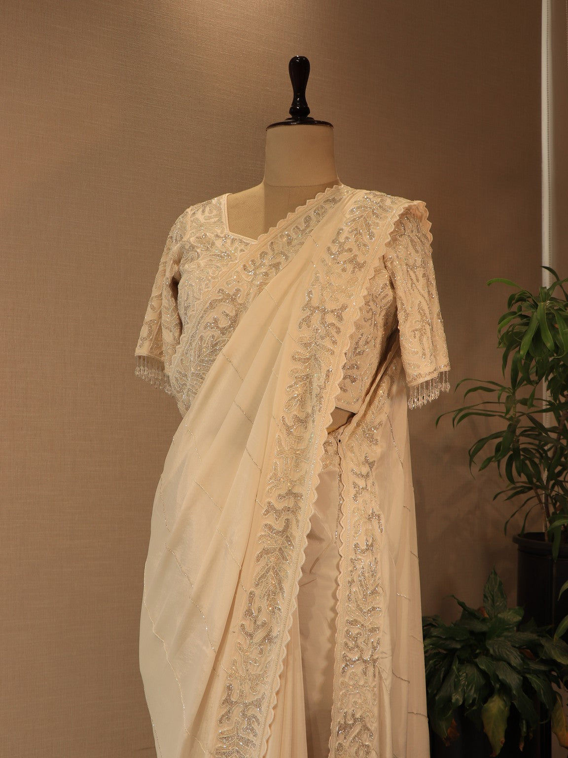 Pearl white embroidered saree