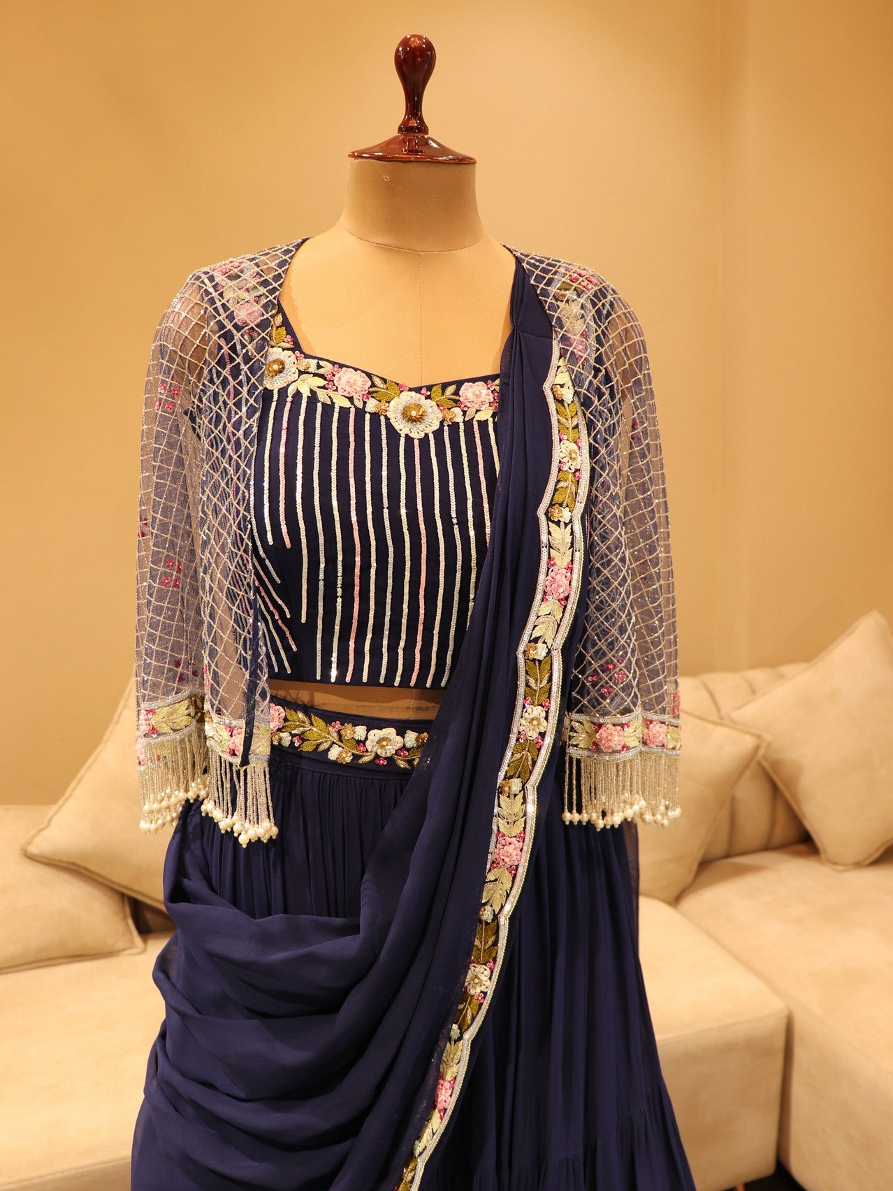 Navy blue crop top with sharara skirt and cape