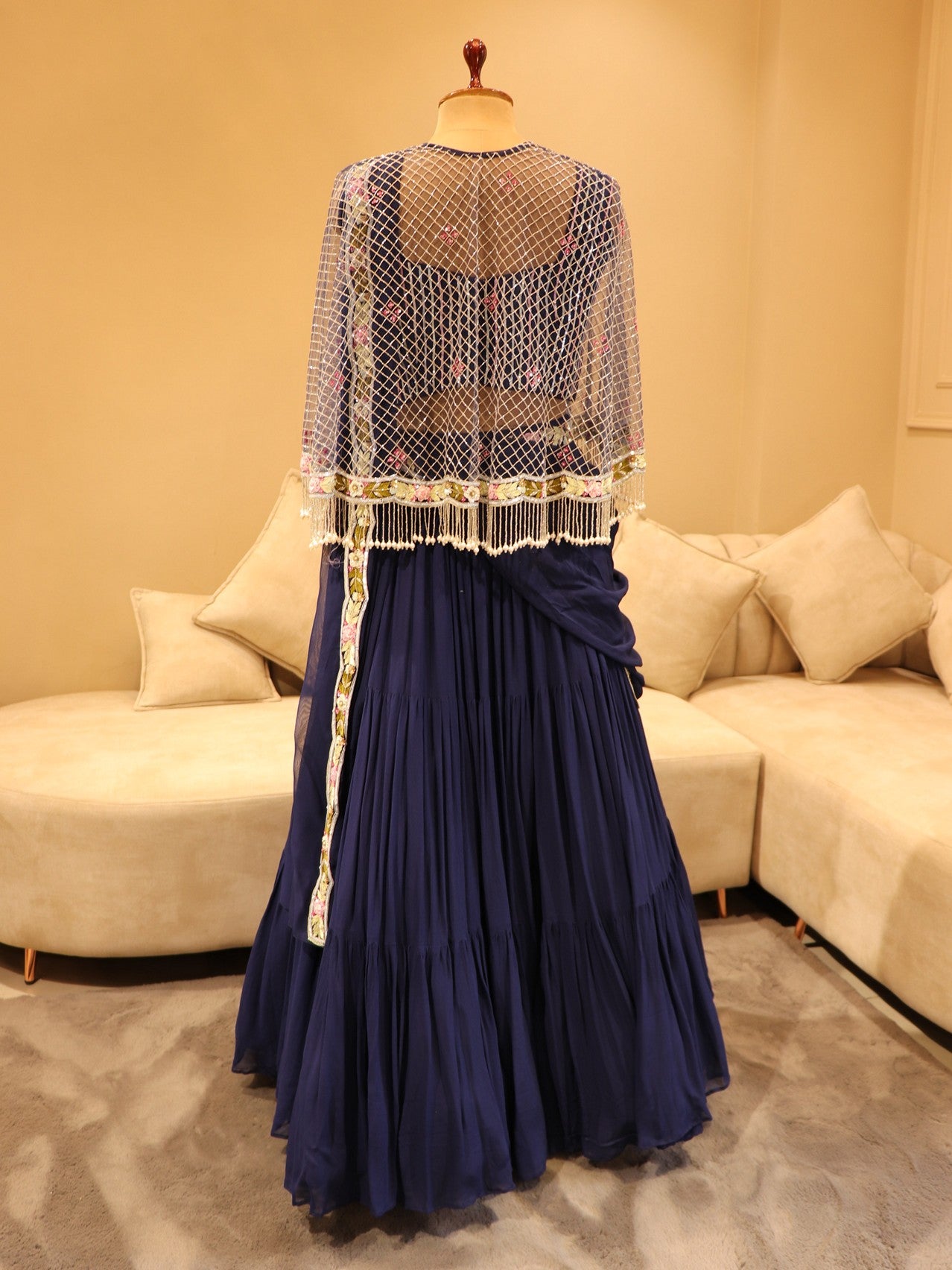 Navy blue crop top with sharara skirt and cape