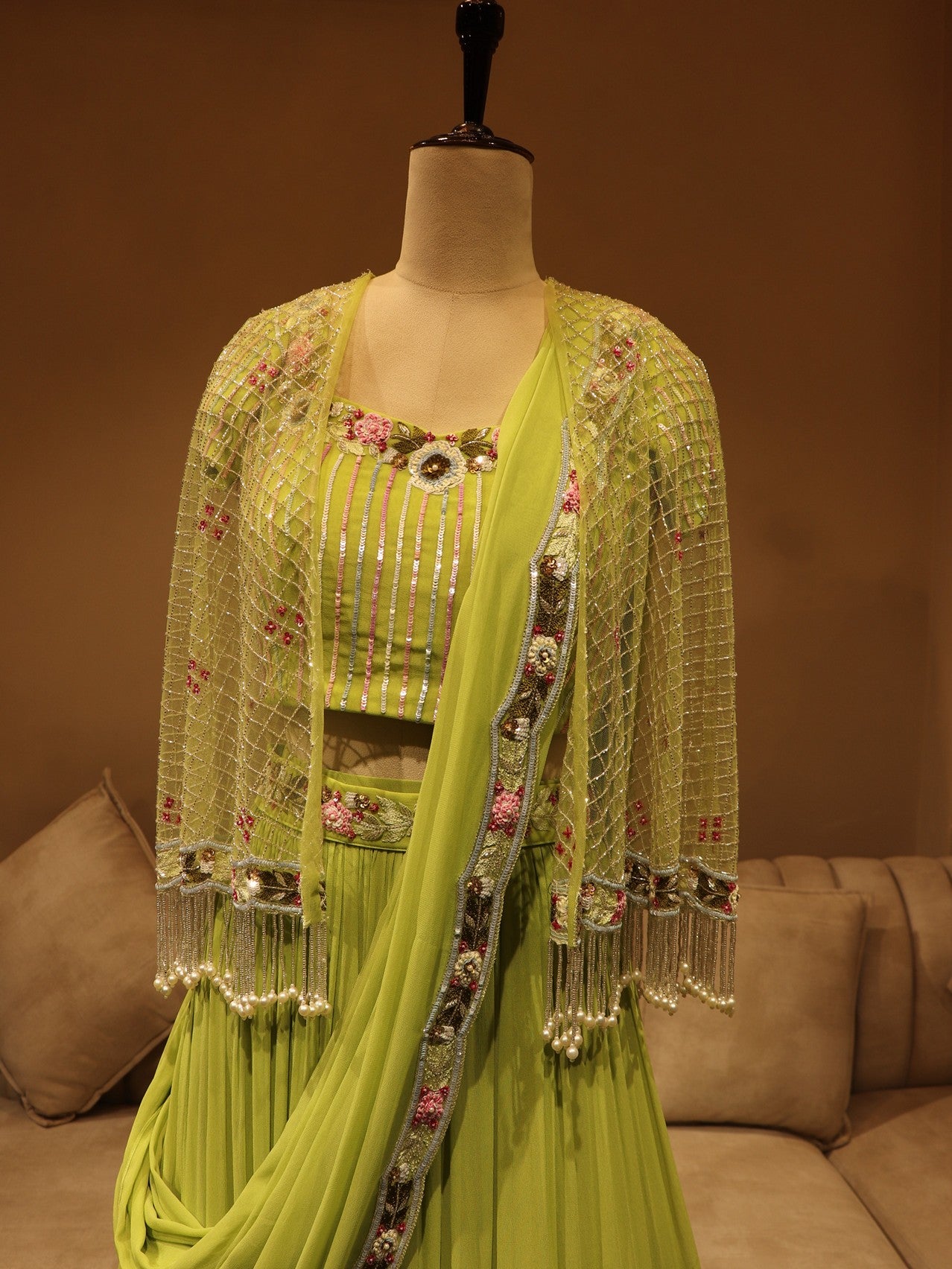 Kiwi green lehenga with cape