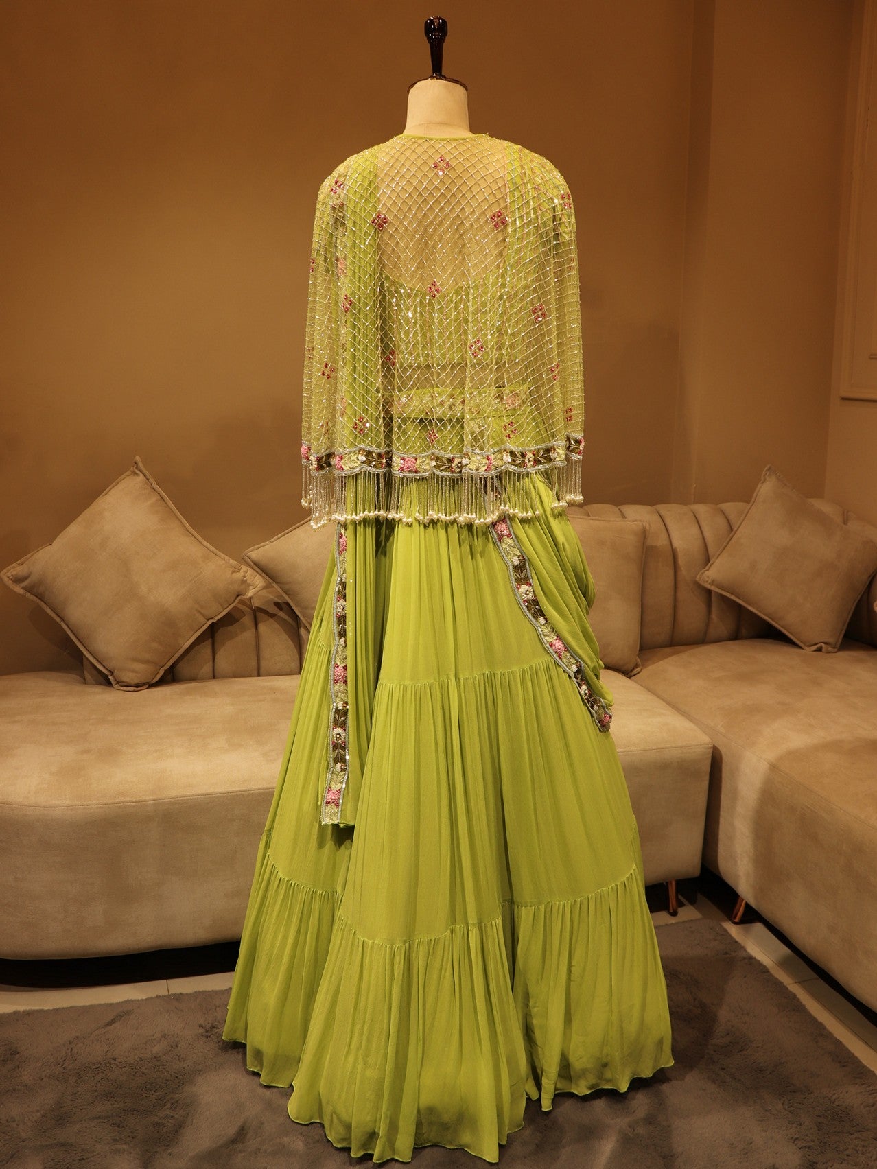 Kiwi green lehenga with cape