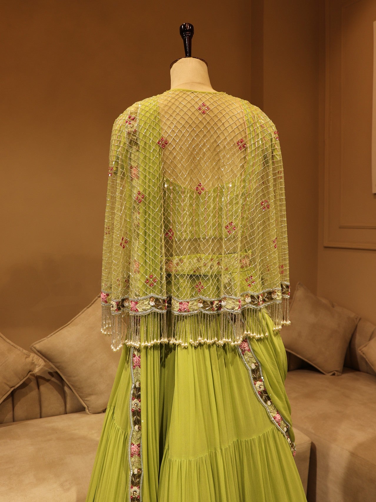 Kiwi green lehenga with cape